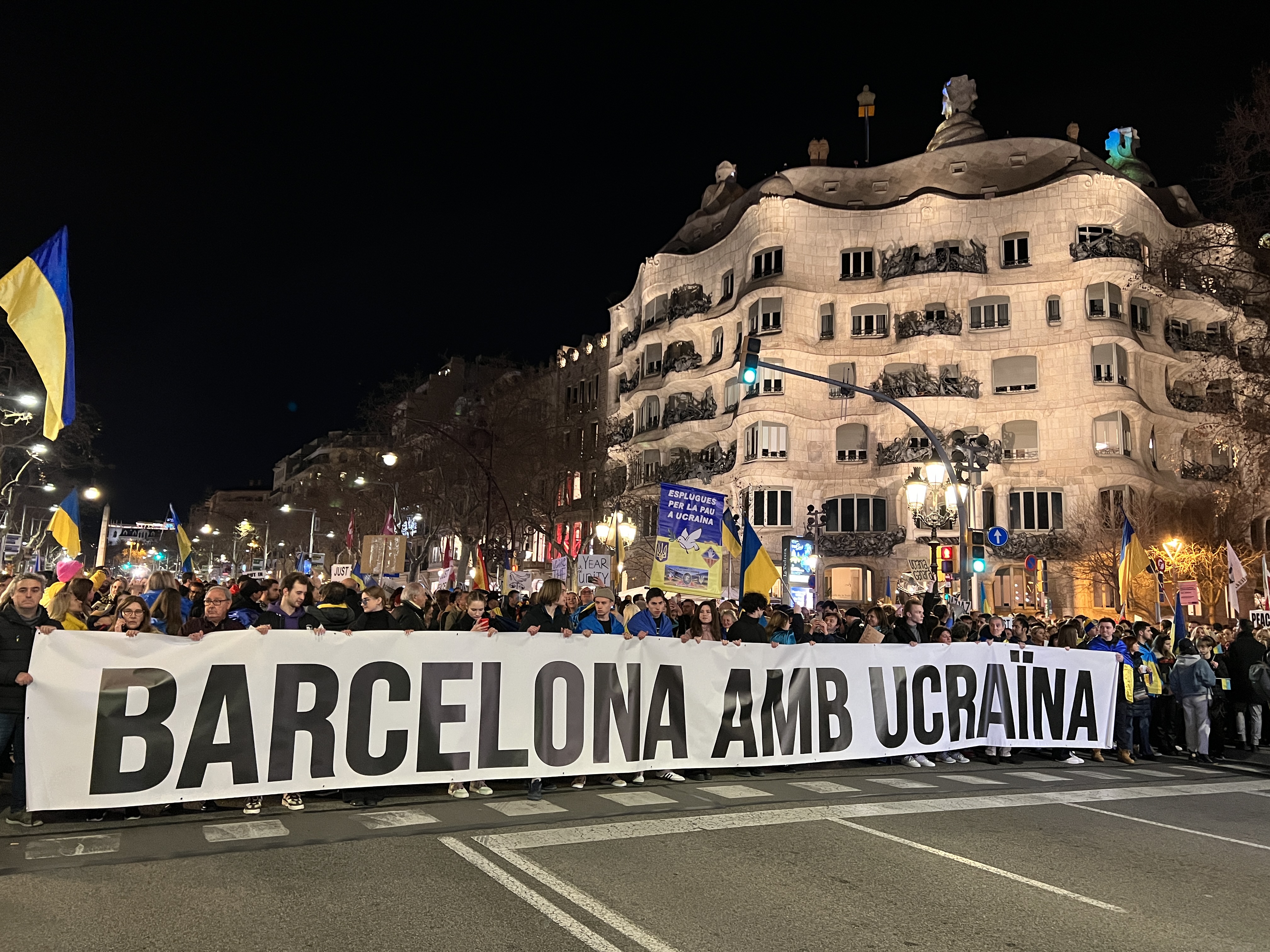 A sign reads 'Barcelona with Ukraine' during a demonstration in Barcelona on February 24, 2023 to support Ukrainians on the first anniversary of the Russian invasion of their home country