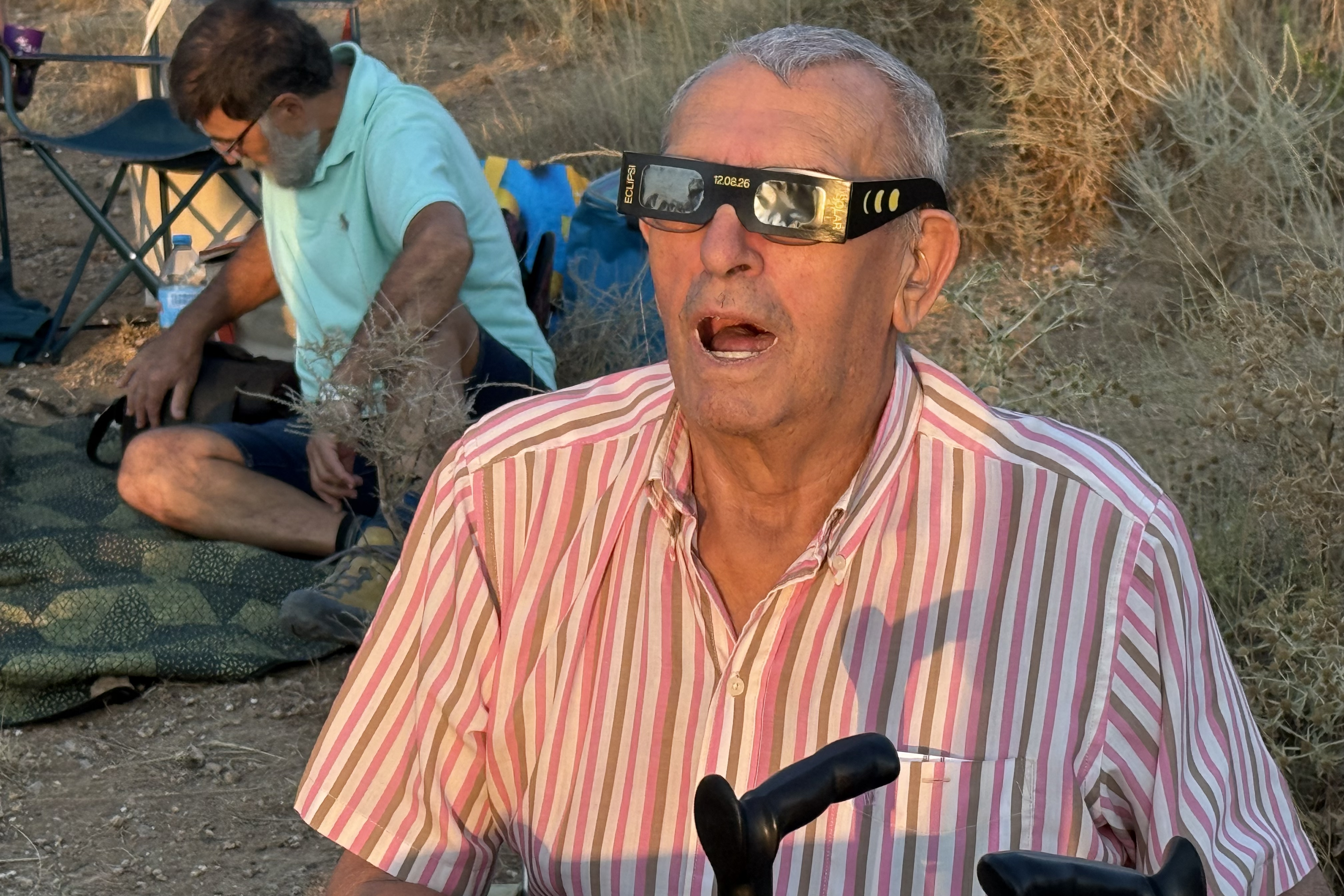 A man gazes in awe at the solar eclipse in Torres de Segre