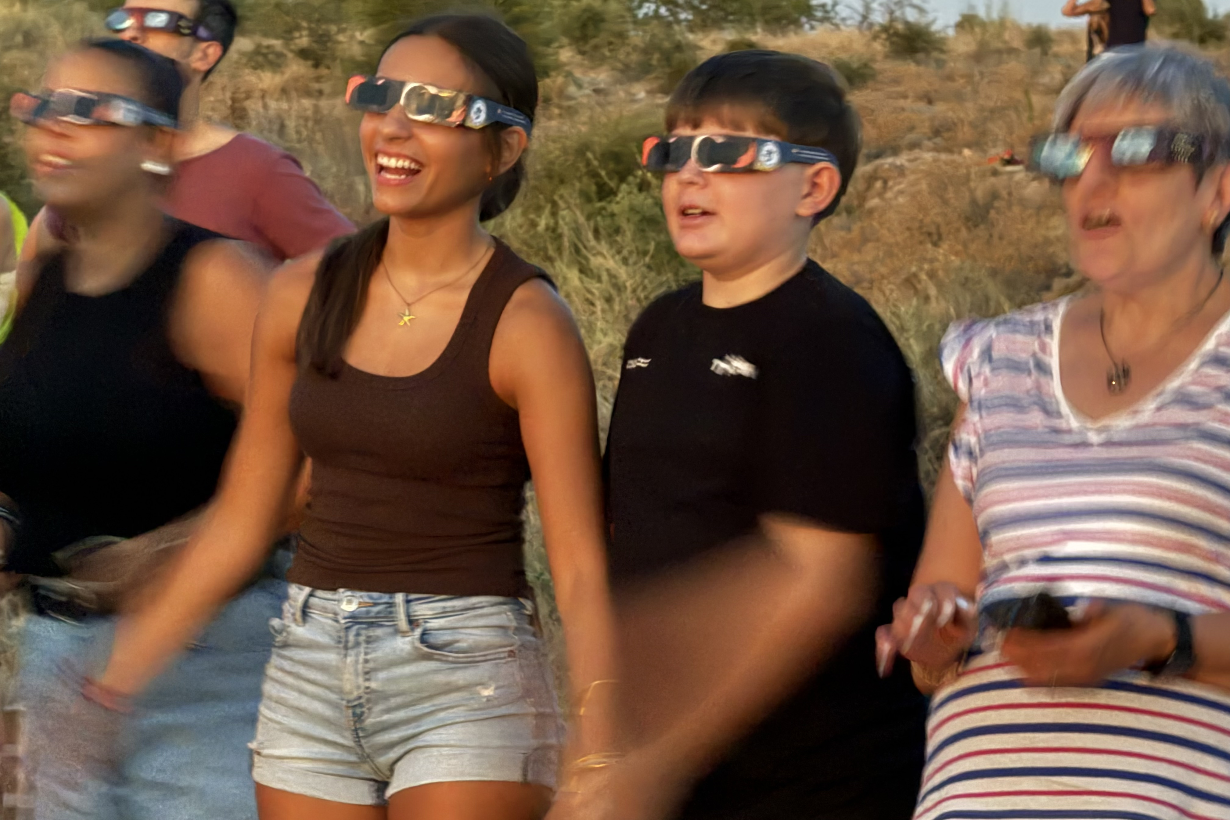 Smiles in Torres de Segre during the total solar eclipse