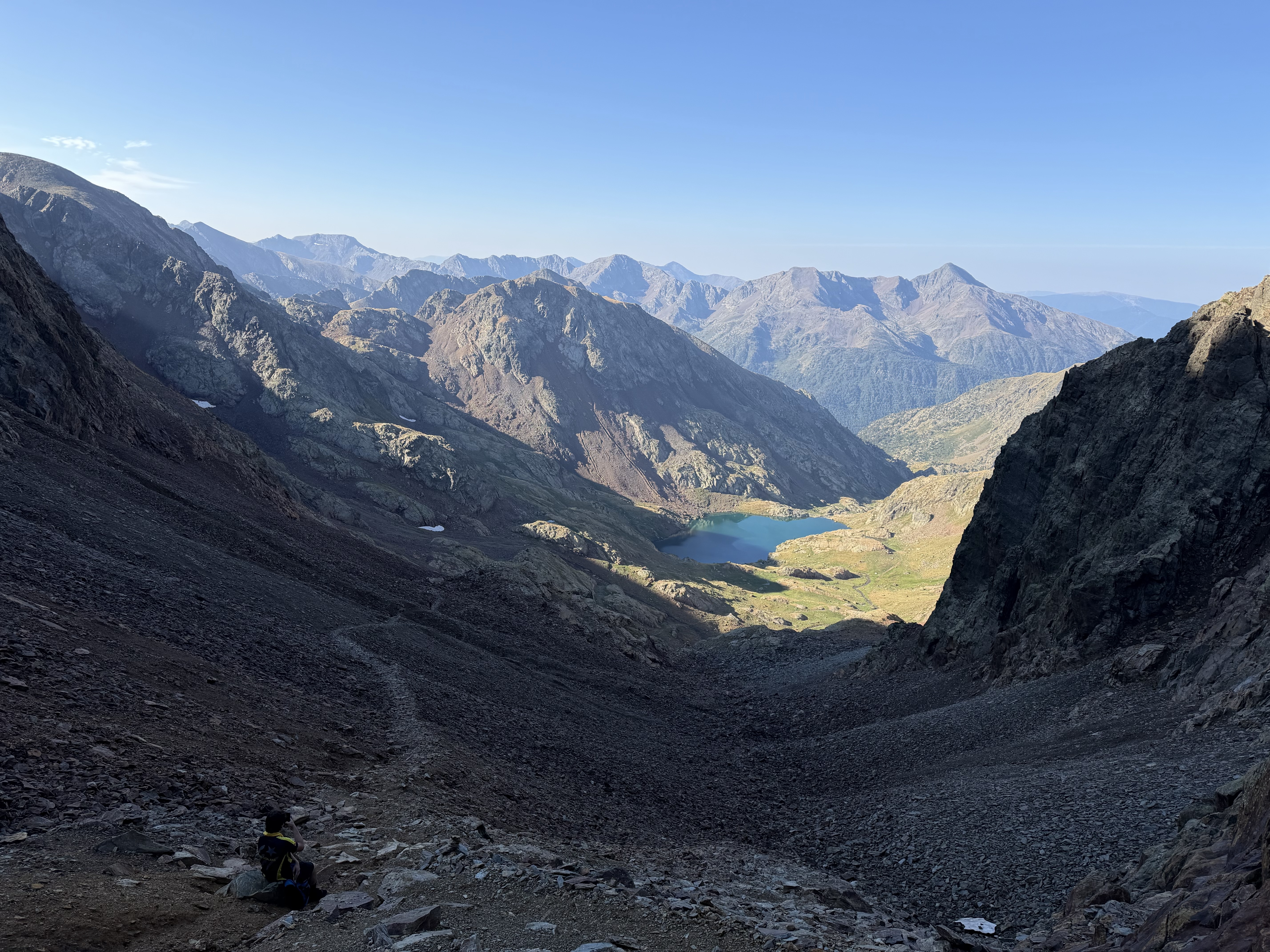 The Pica d'Estats scree slope, with the Sotllo lake in the background