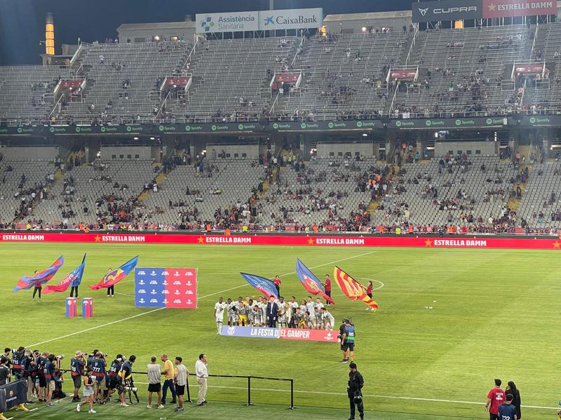 AS Monaco pose with the Gamper Trophy after most Barça fans have departed from Montjuïc Stadium