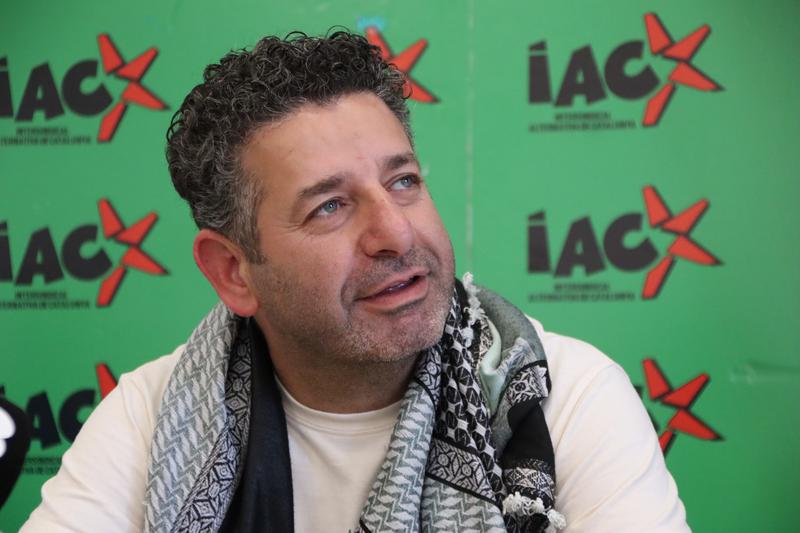 Activist Saif Abukeshek at press conference in Barcelona