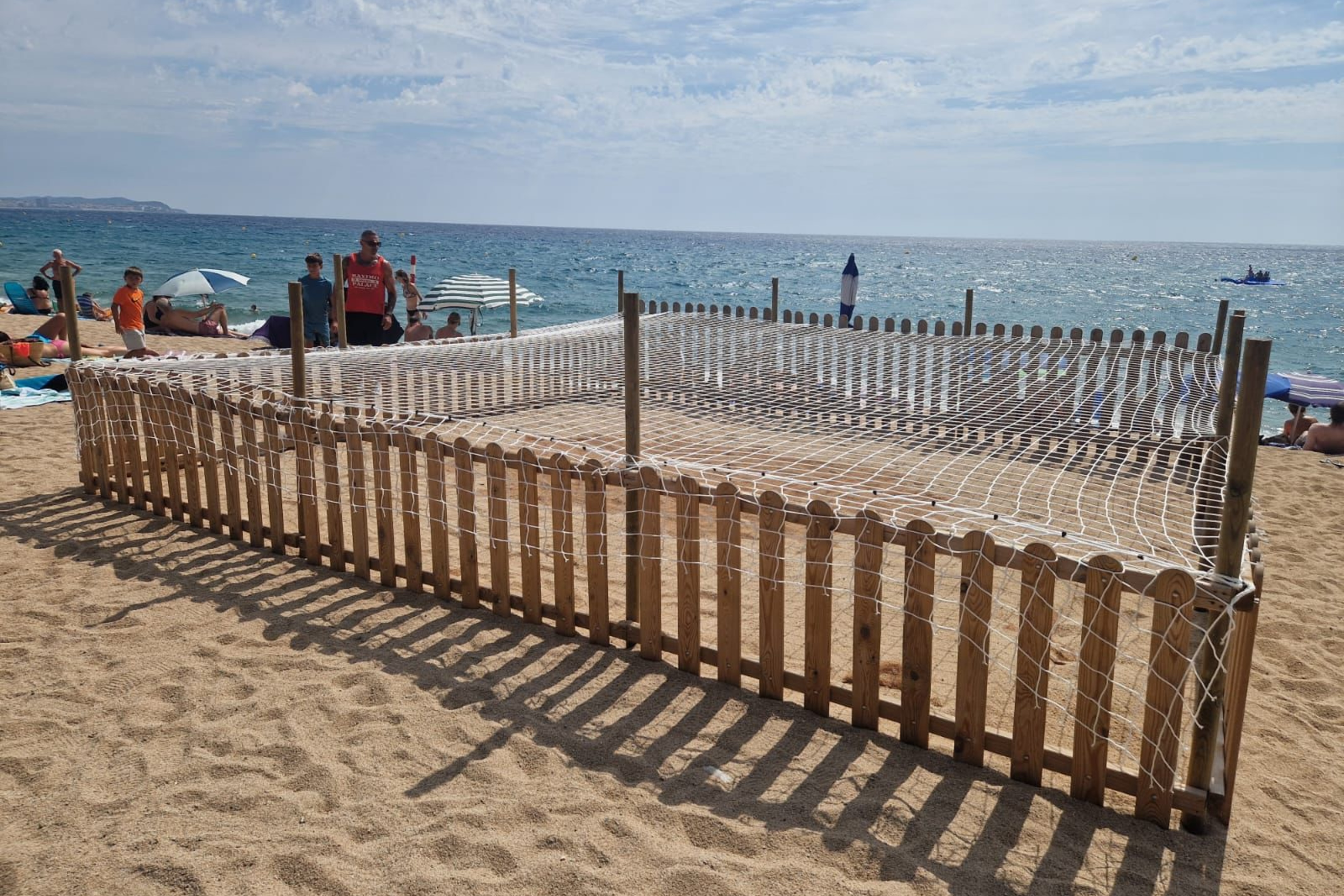 An enclosed area where a turtle laid 80 eggs in Platja d'Aro's beach