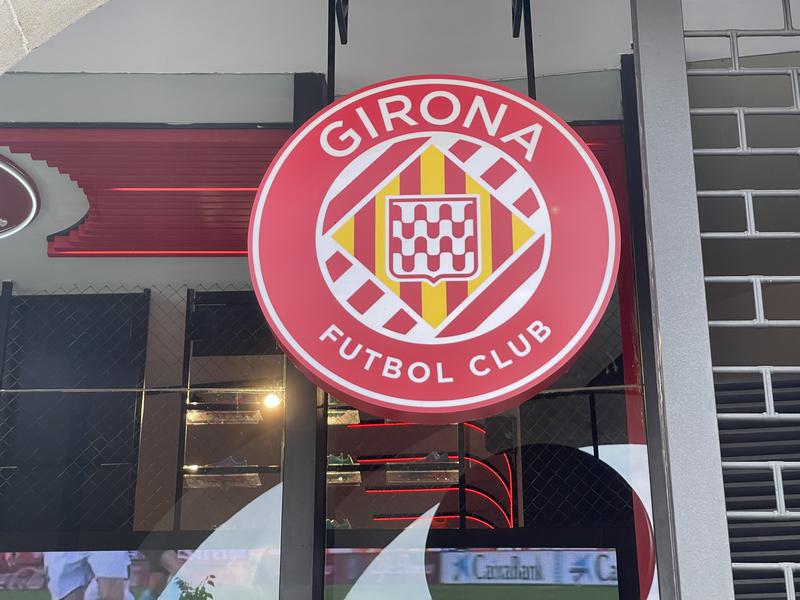 The Girona crest at one of their club shops in the city