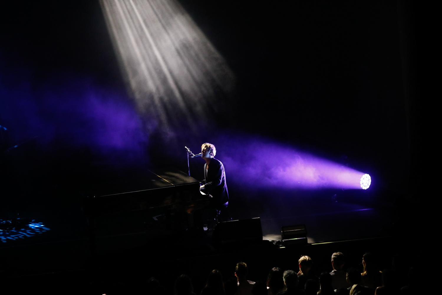 Singer Tom Odell plays the piano and sings during a concert in Barcelona on July 25, 2023