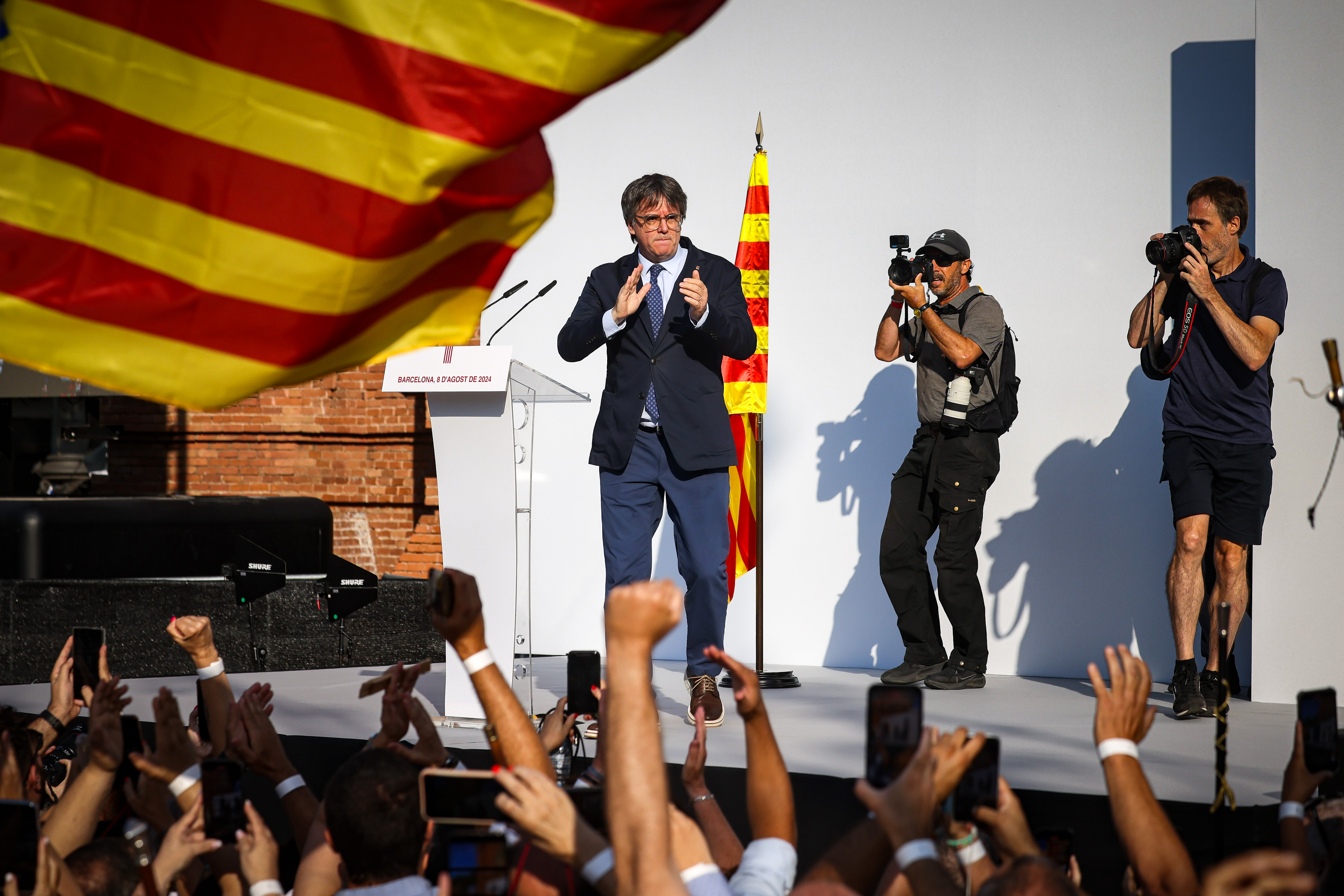 Carles Puigdemont speaks to gathered supporters in Barcelona, August 8, 2024