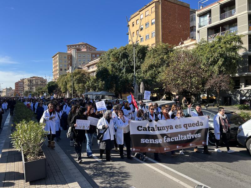 Striking healthcare workers protest in the Sants area of Barcelona, calling for an improvement in public services