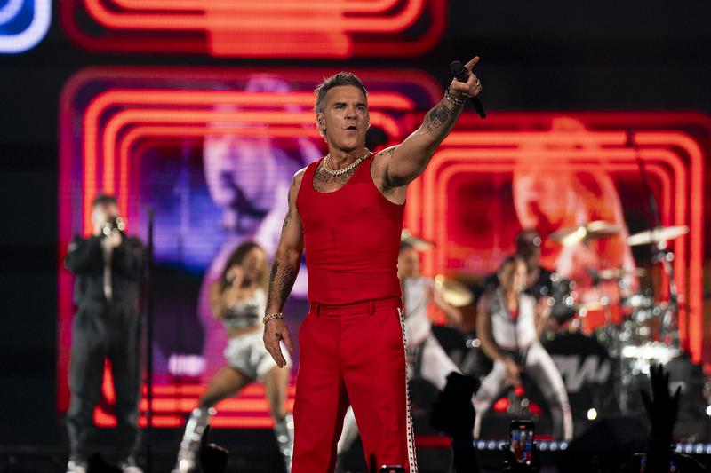 Singer Robbie Williams performing at RCDE Stadium