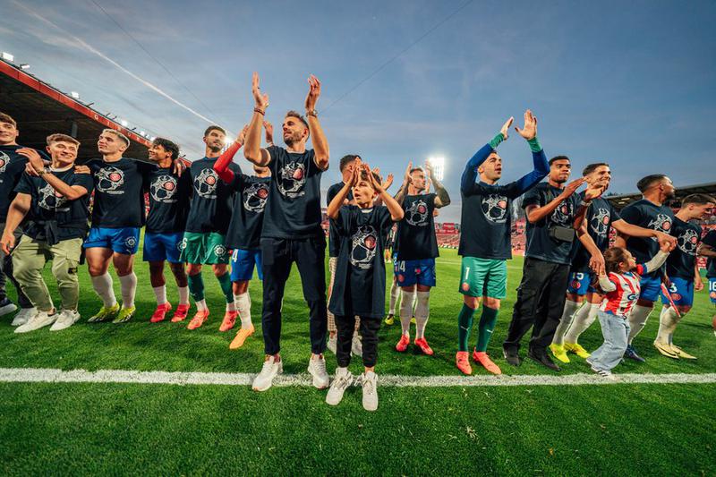 Girona celebrate qualifying for the Champions League for the first time in their history