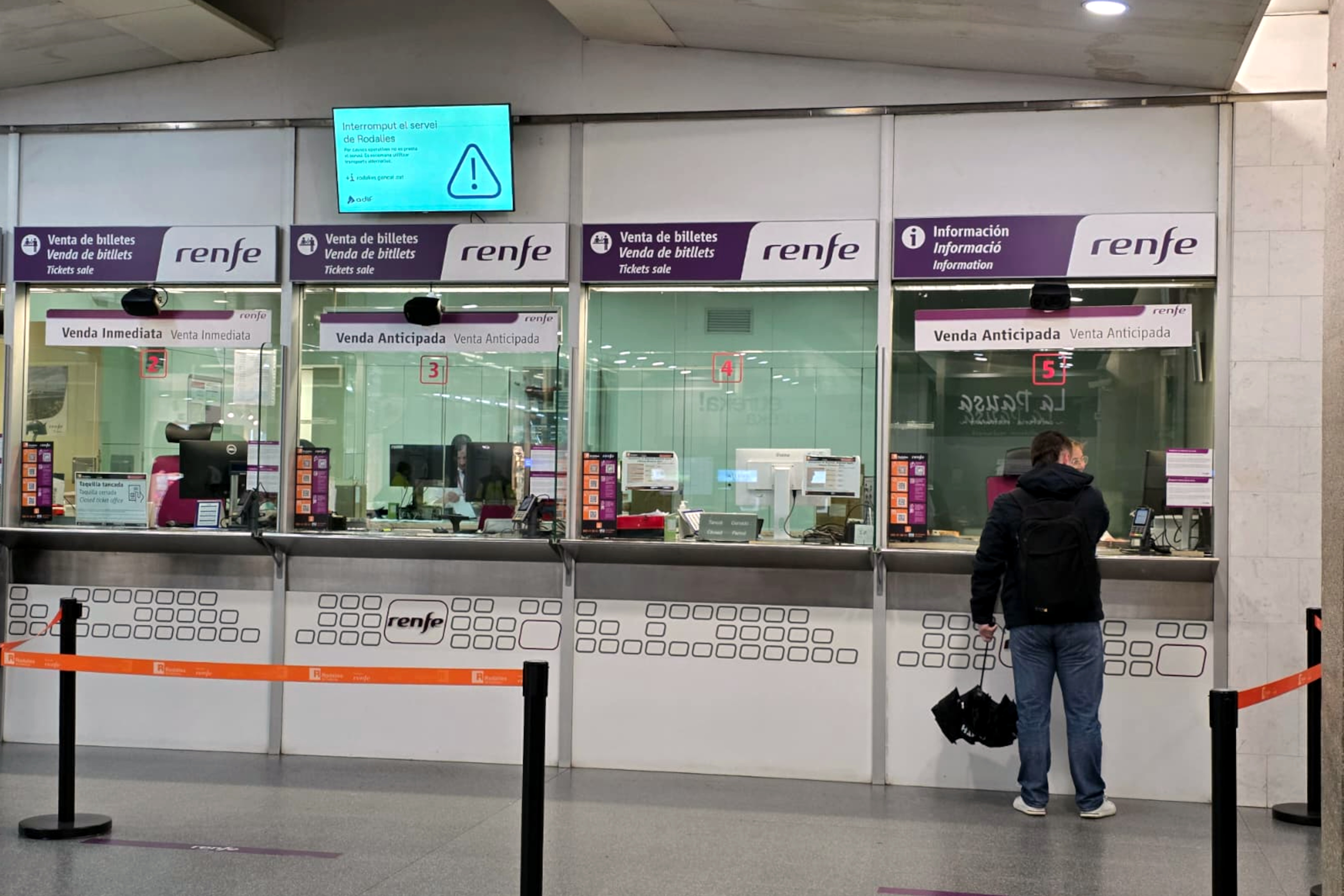 One of the train travelers at a Renfe customer service booth at Girona's train station on January 22, 2026