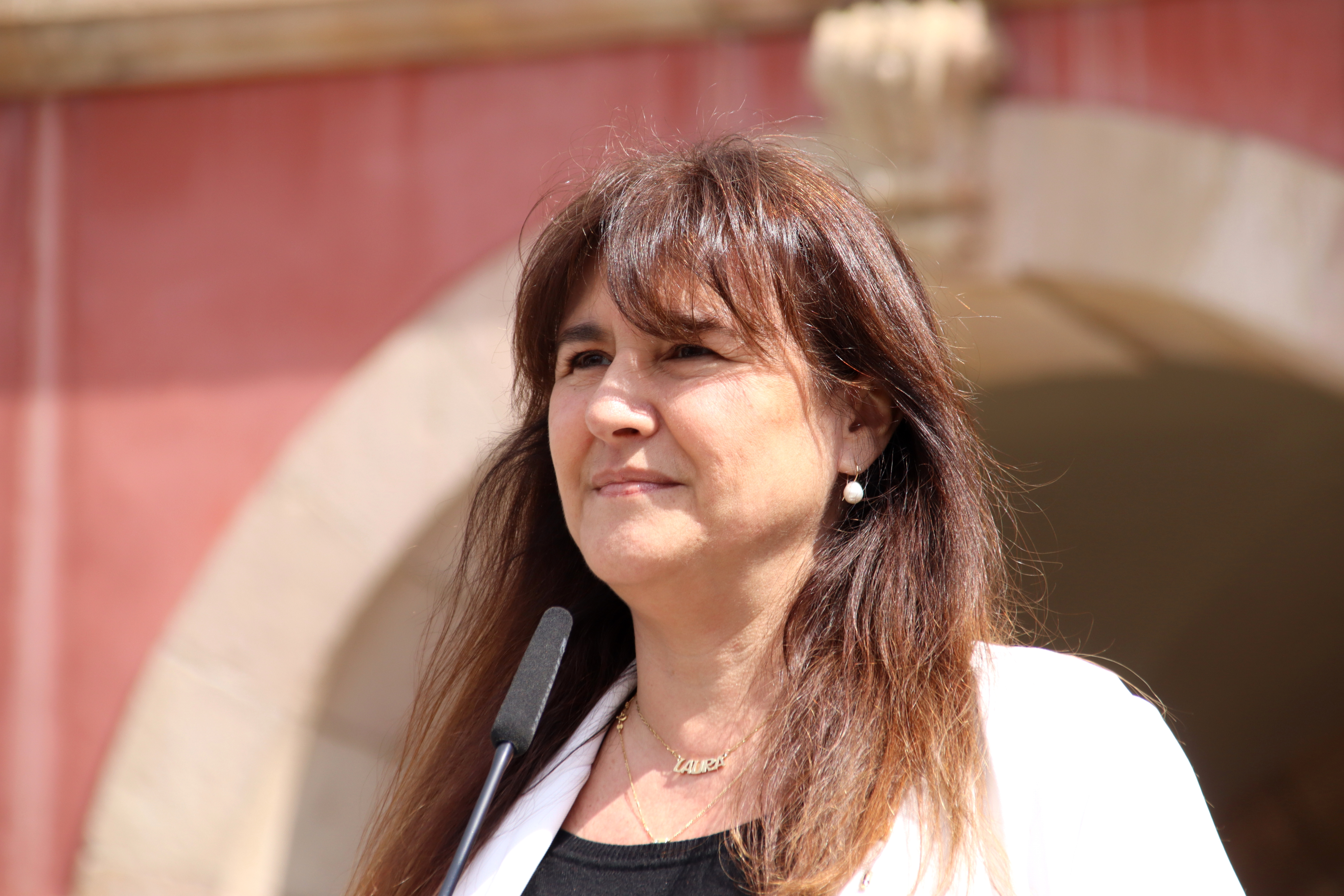 Laura Borràs giving a press conference outside the Catalan parliament following her conviction in her corruption trial