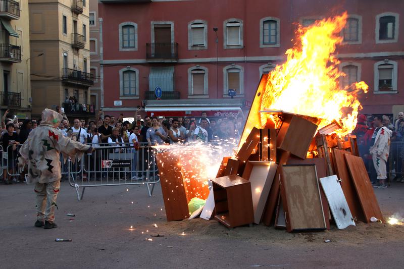The Sant Joan bonfire being lit in the neighborhood of Barceloneta in the Catalan capital