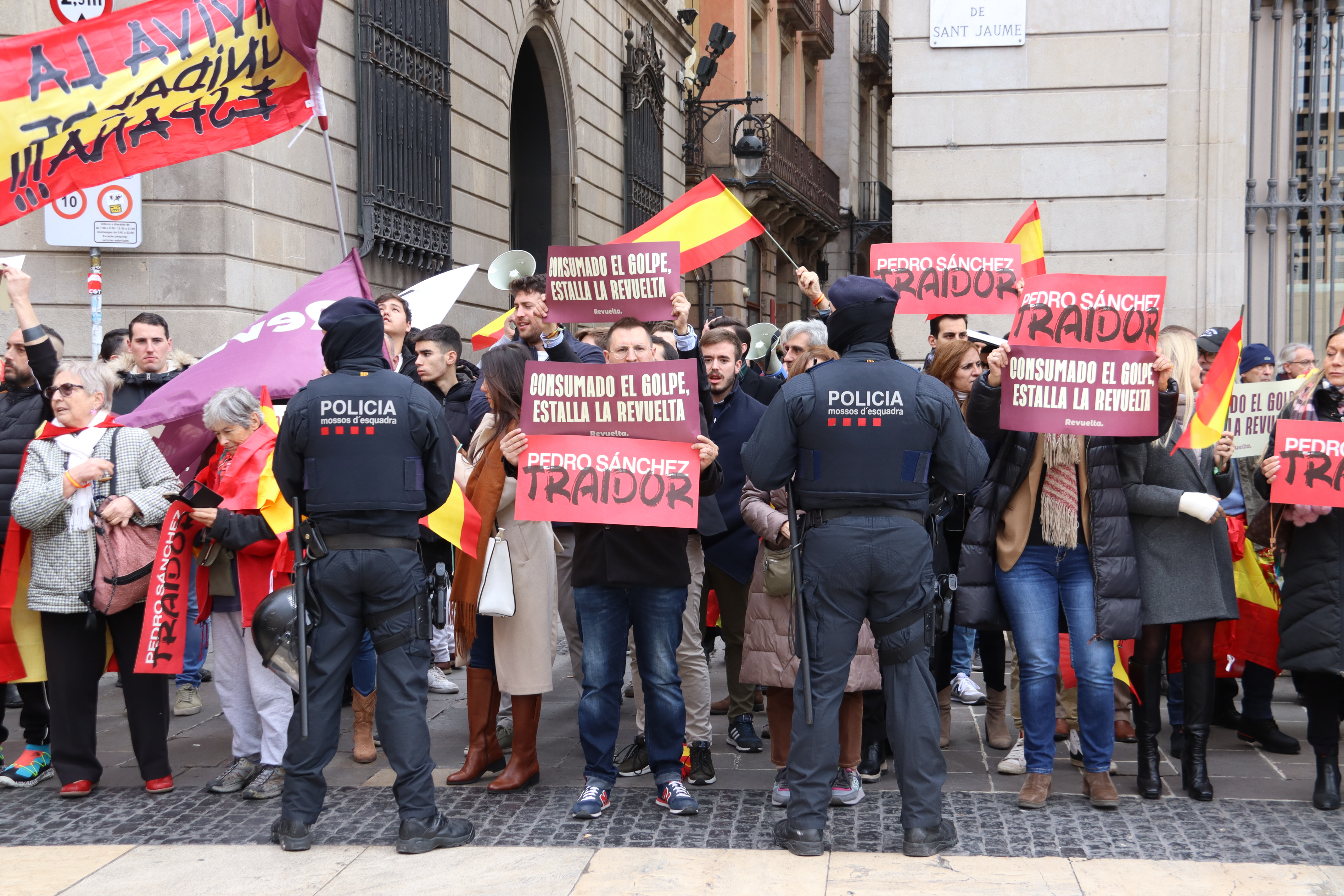 Protesters from Revuelta, an anti-independence group linked to the far-right Vox