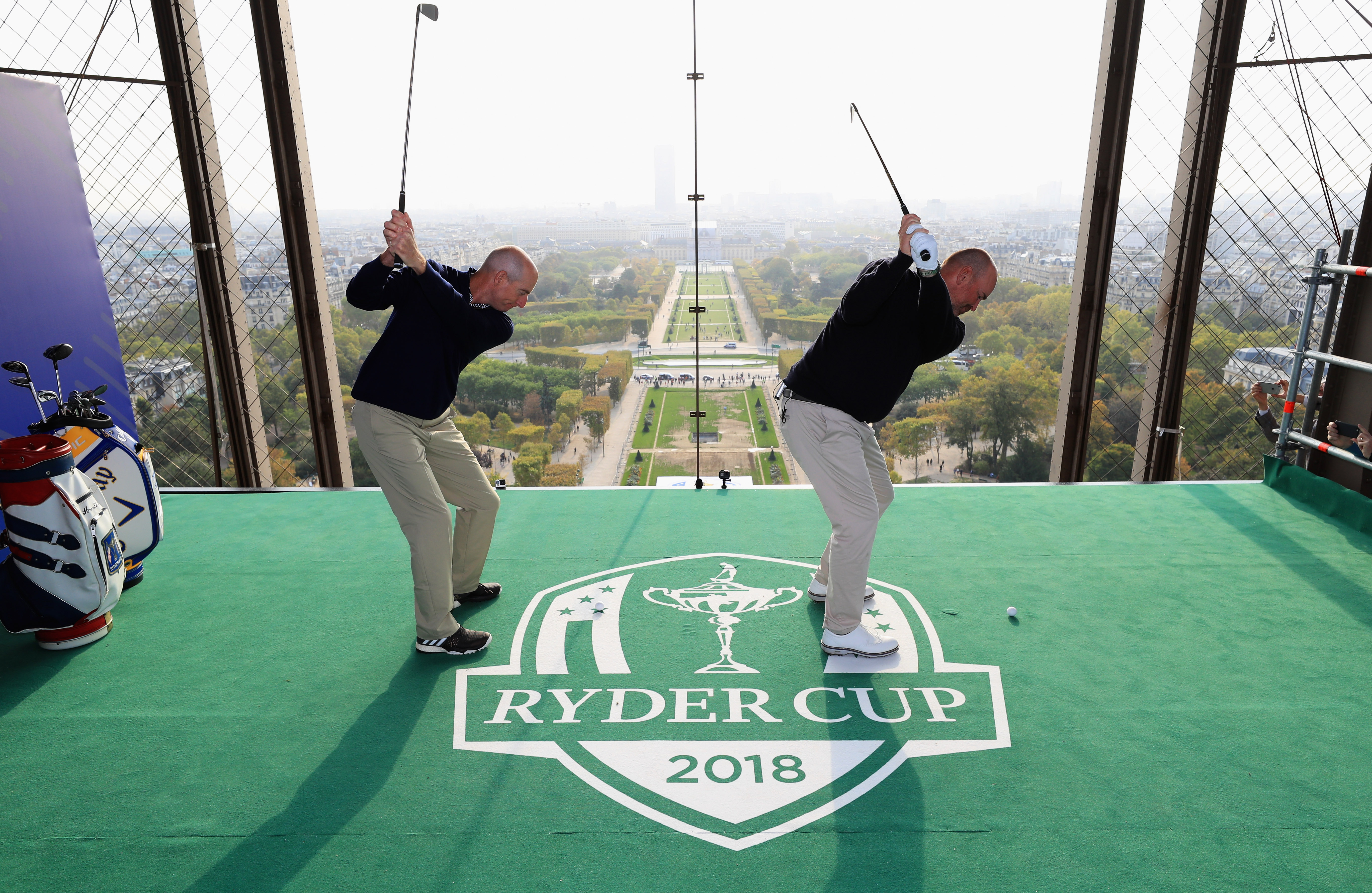 Two golfers on a tower during the 2018 Ryder Cup in France