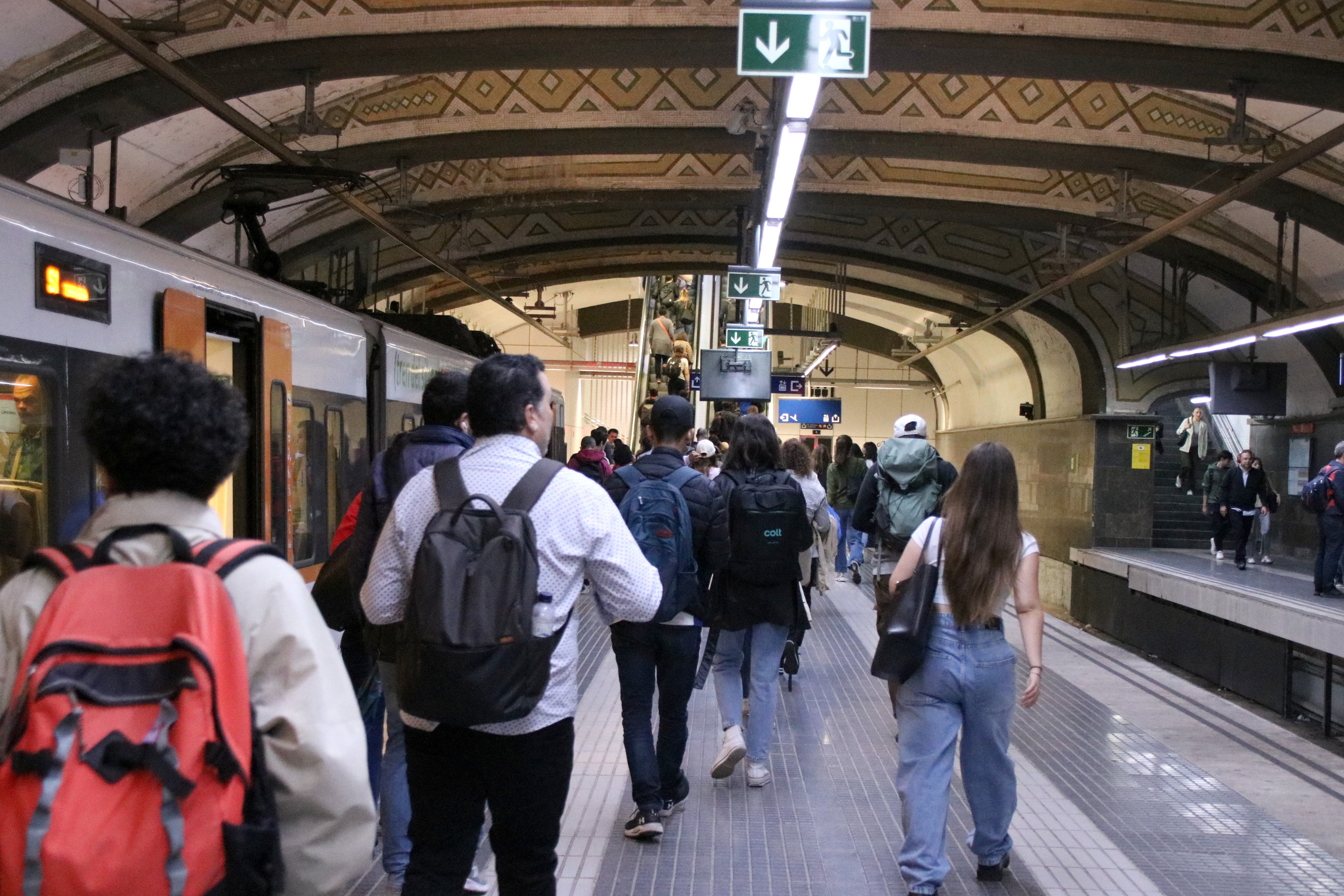 Passengers on the Ferrocarrils (FGC) commuter line in Barcelona Plaça Catalunya