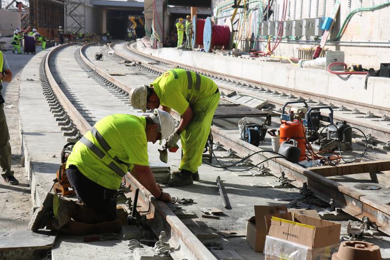 Workers in 'La Sagrera' train station construction site on October 25, 2022