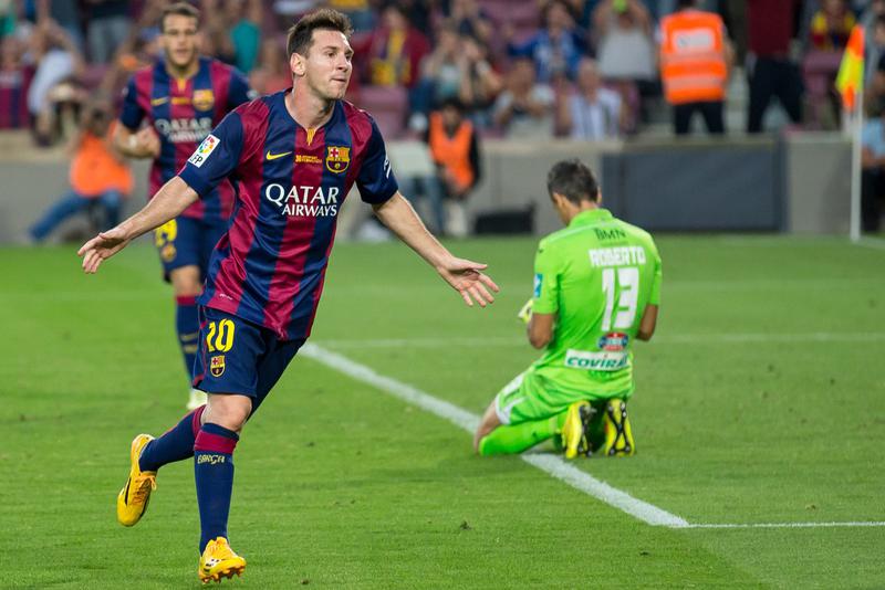 Lionel Messi with F.C. Barcelona celebrates after scoring a goal during a game against Granada CF in October 2014