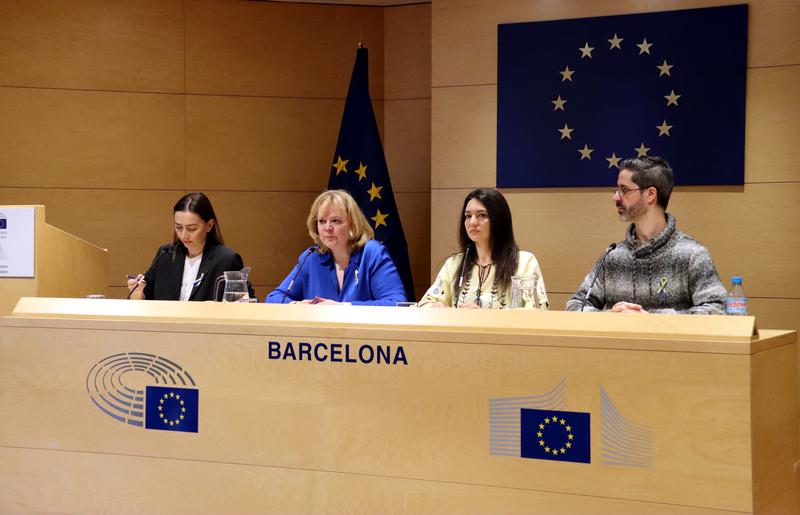 Ukrainian journalists and activists Sasha Molotkova, Yuliya Dovgopola, and Karina Feka, alongside Catalan activist Carlos González