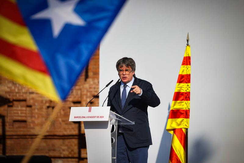 Former president Carles Puigdemont speaks in Barcelona after returning to Catalonia for the first time in seven years