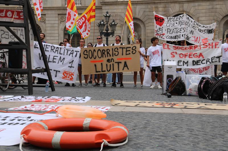 Lifeguards protesting in Barcelona's Sant Jaume square