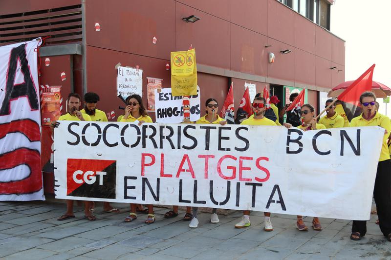 Lifeguards protesting on Bogatell beach during their indefinite strike
