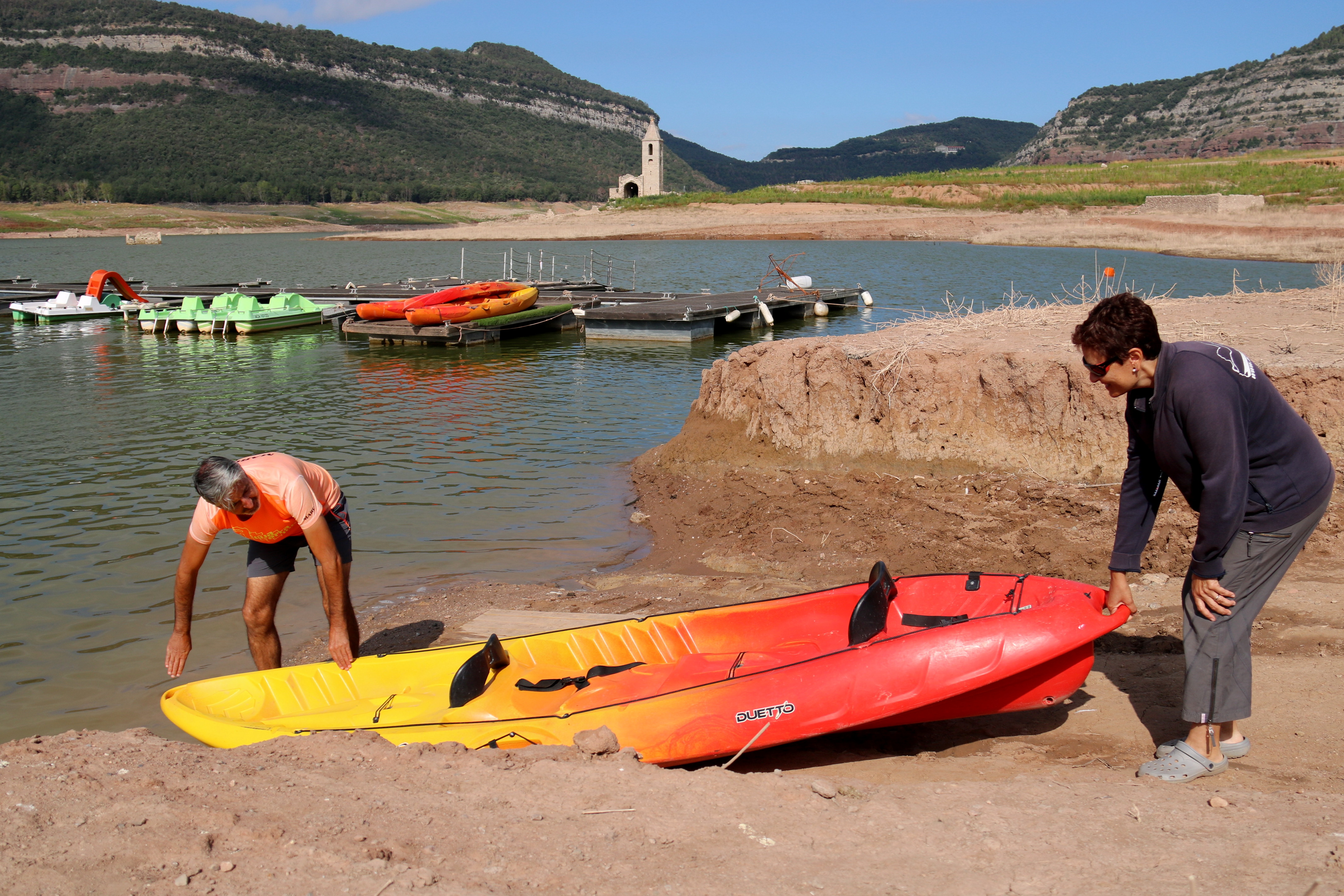 A kayak in the visibly drought-stricken Sau reservoir in central Catalonia
