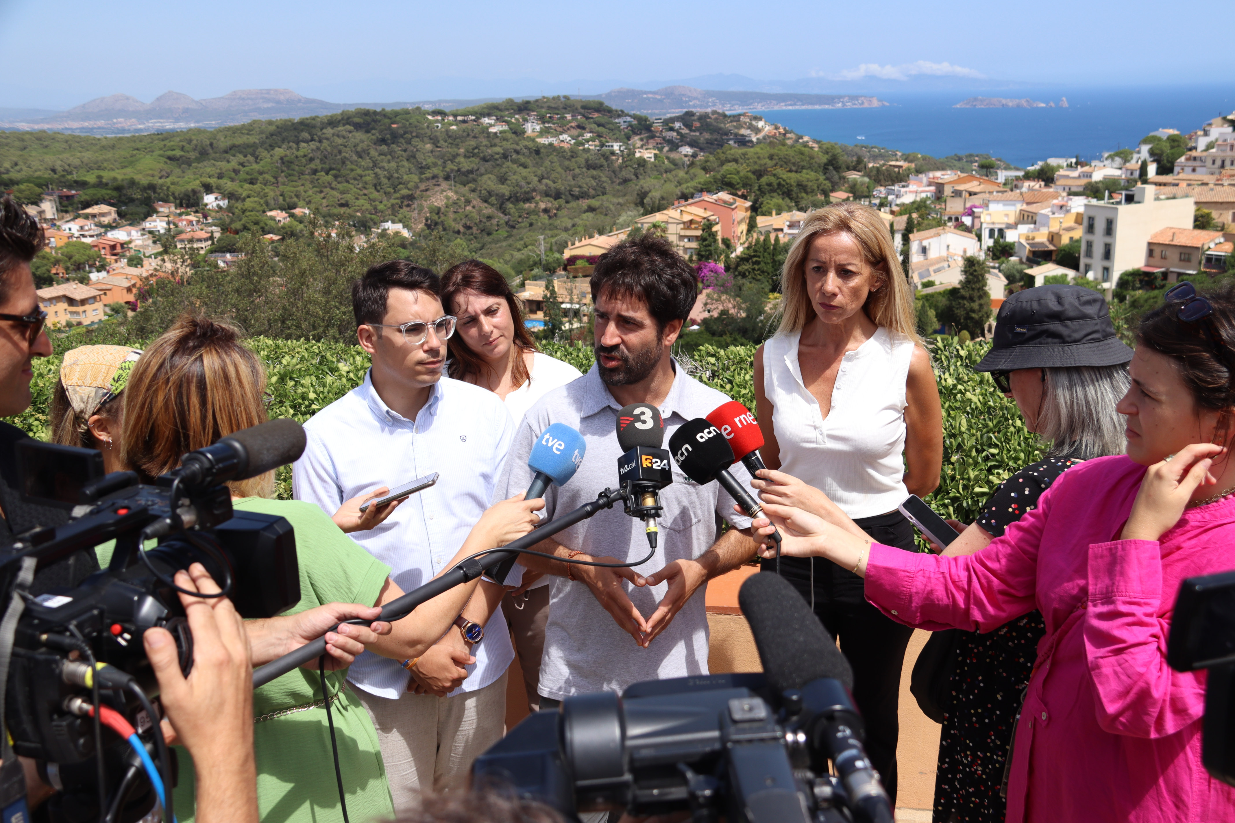 PDeCAT candidate for congress Roger Montañola speaks to media outlets in the seaside town of Begur, in the Costa Brava on July 15, 2023