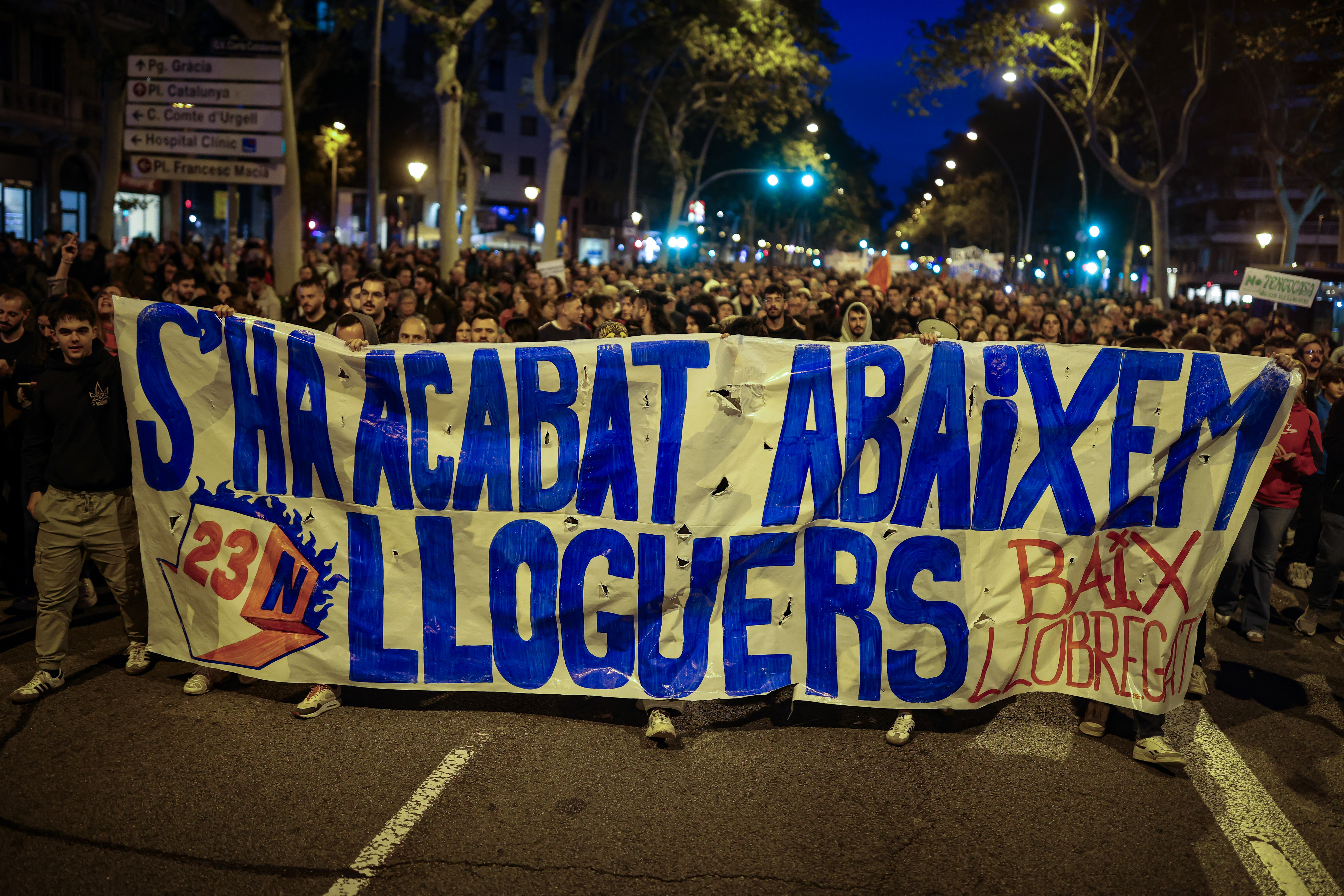 "It is over: lower the rents," reads one of the signs at the housing protest in Barcelona on November 23