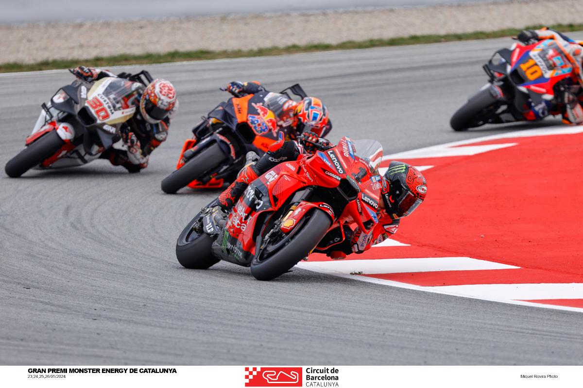 Several Moto GP drivers compete in the Circuit de Barcelona-Catalunya during the 2024 Grand Prix