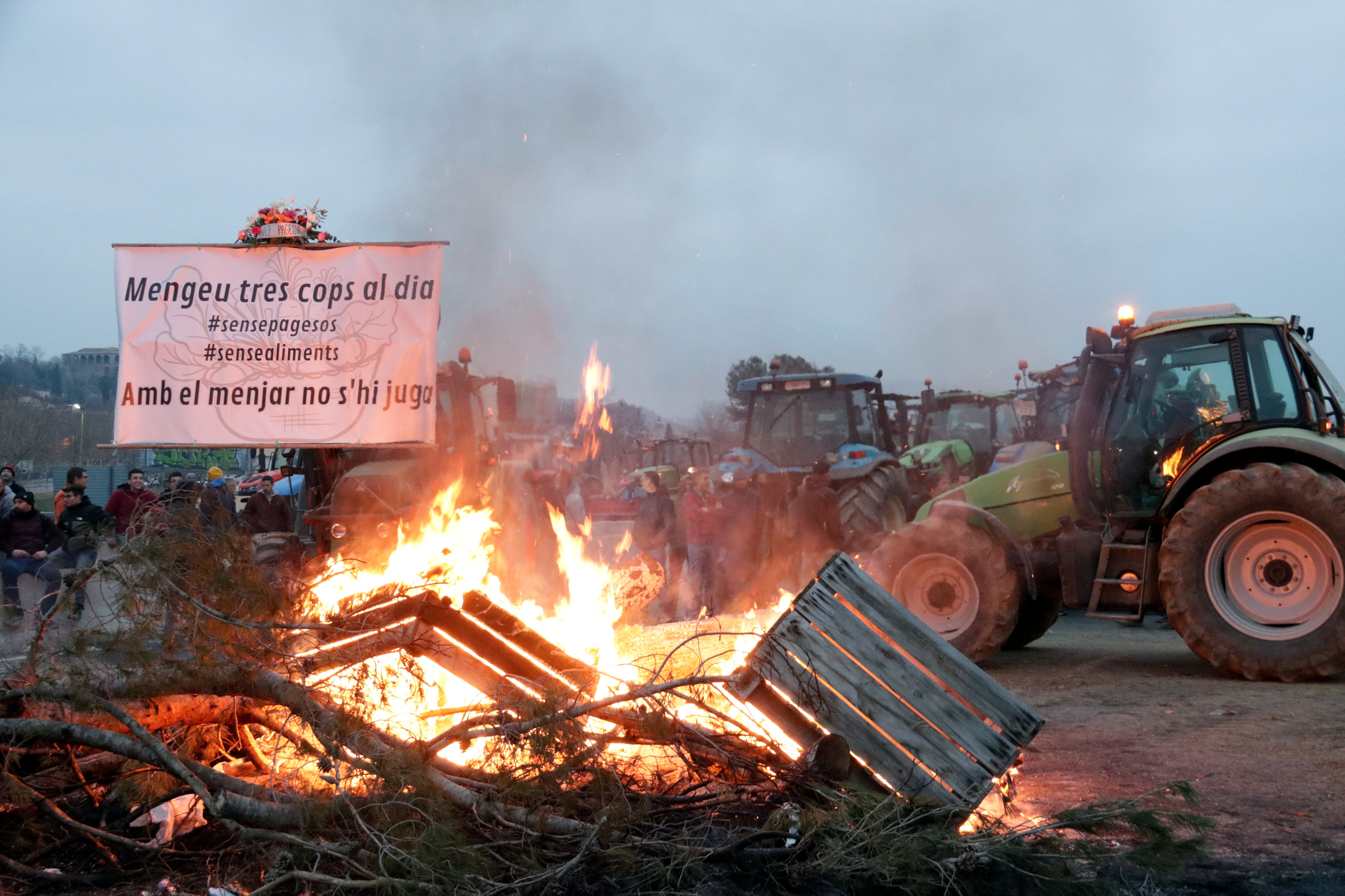 Protesting farmers block the AP-7 highway in February 2024