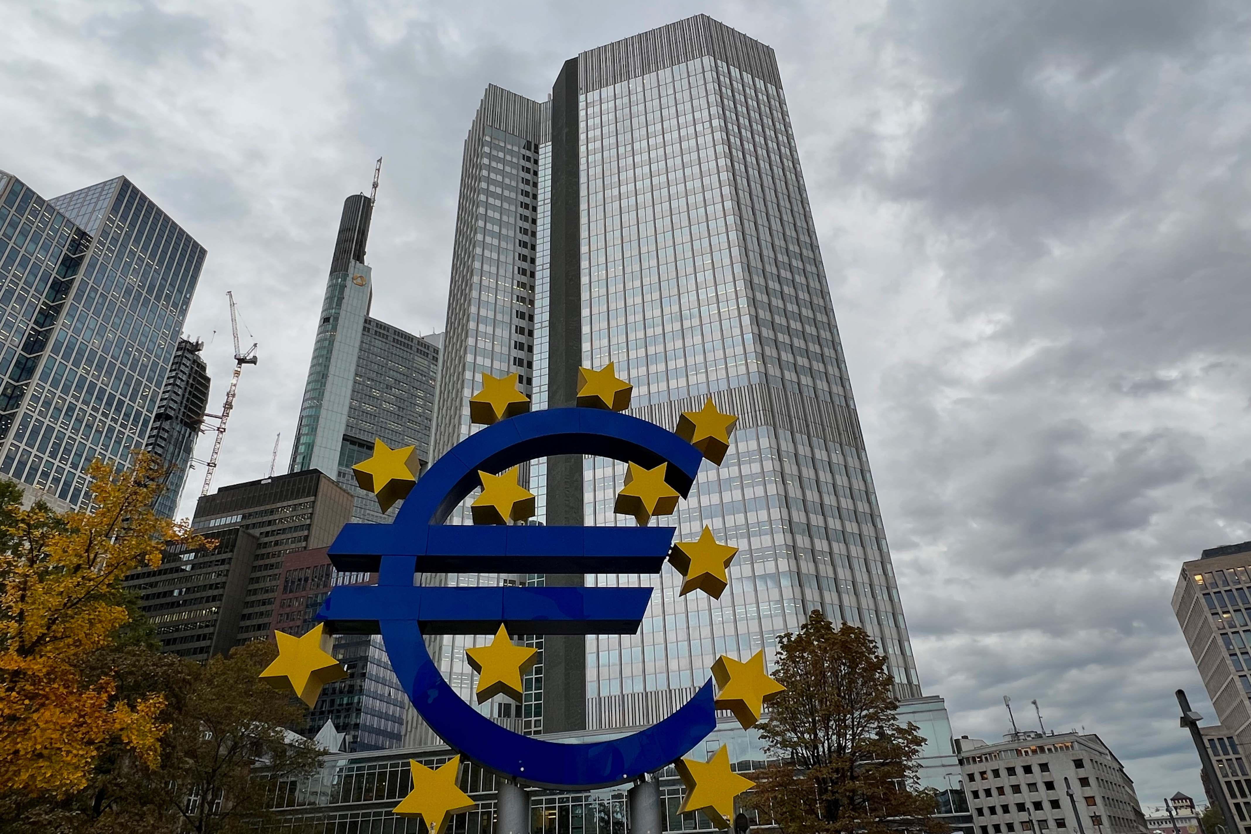 The former European Central Bank headquarters in Frankfurt with the € logo in front of the Euro Tower