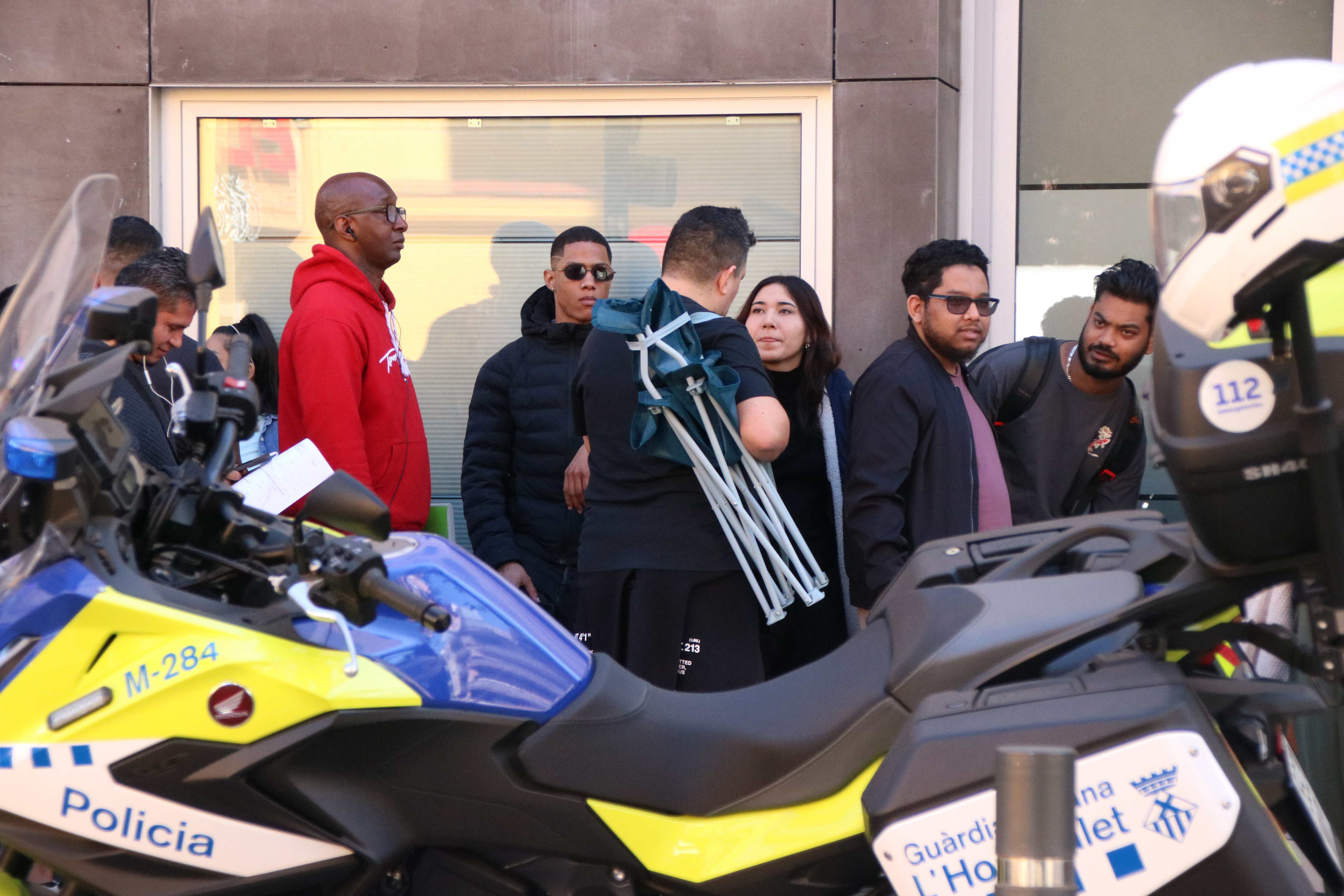 One of the people in line to access La Fatga with a folding chair to endure hours of waiting.