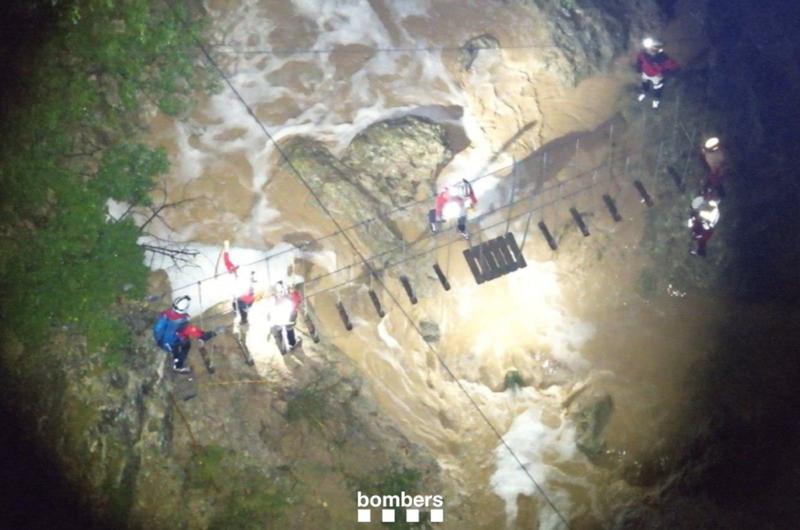 Emergency services look for a missing person in Mediona after torrential rain recorded on September 21, 2025