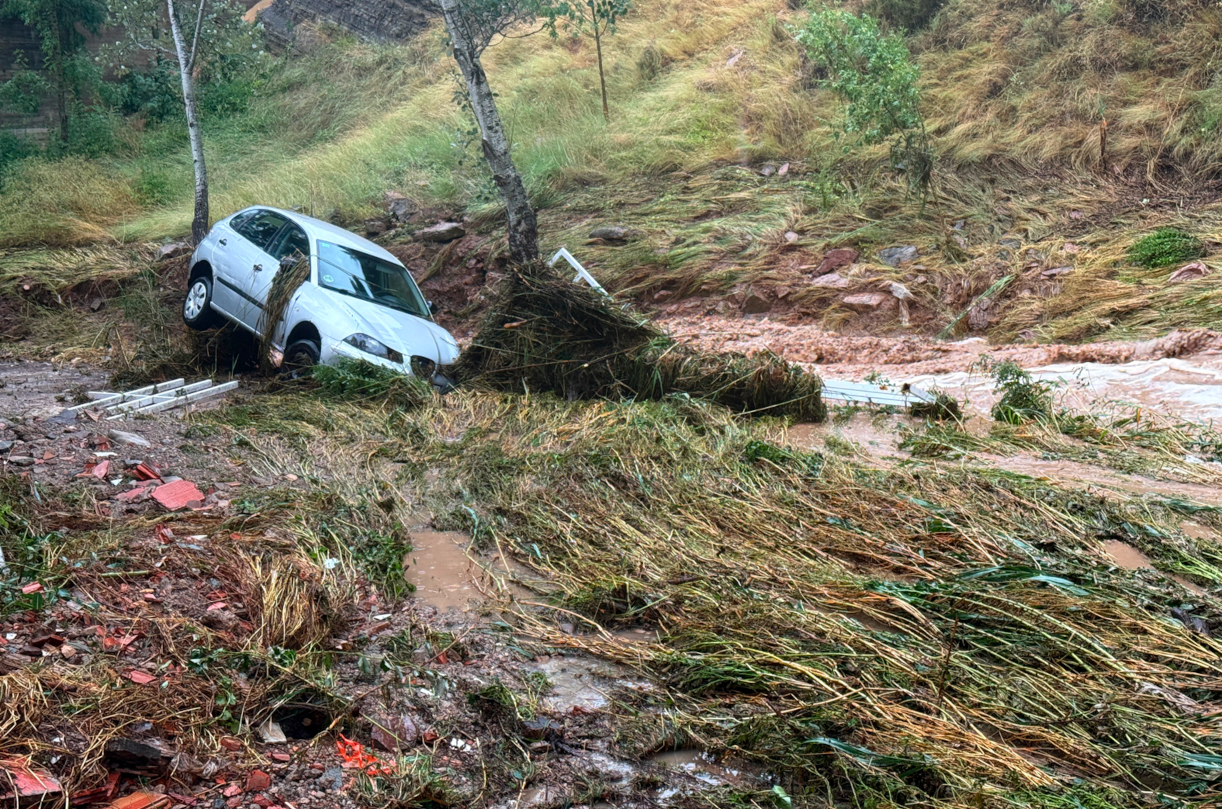 A car swept away by the Cardener river during the storm