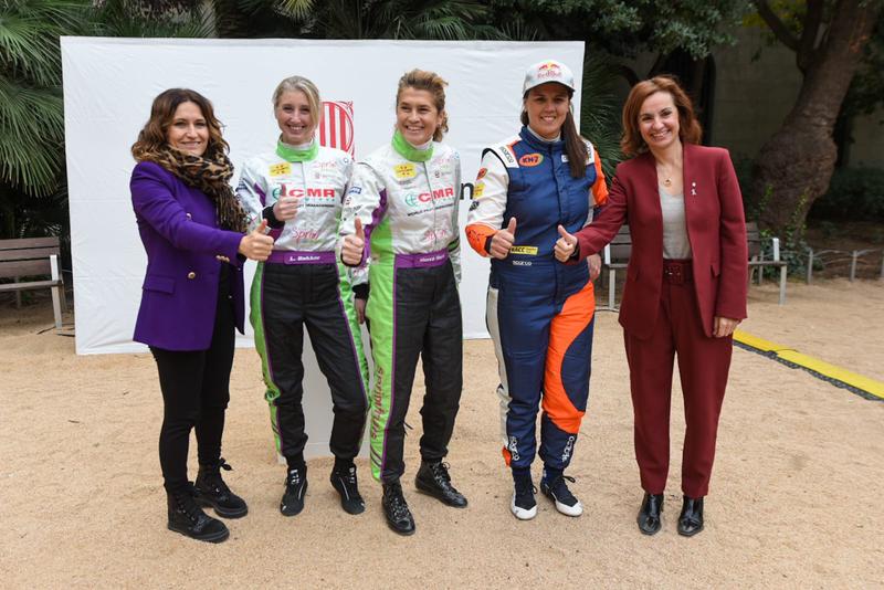 Motorsports athletes Laia Sanz and Mercè Martí pose for photographs with presidency minister Laura Vilagrà and Catalan government general secretary for sports Anna Caula