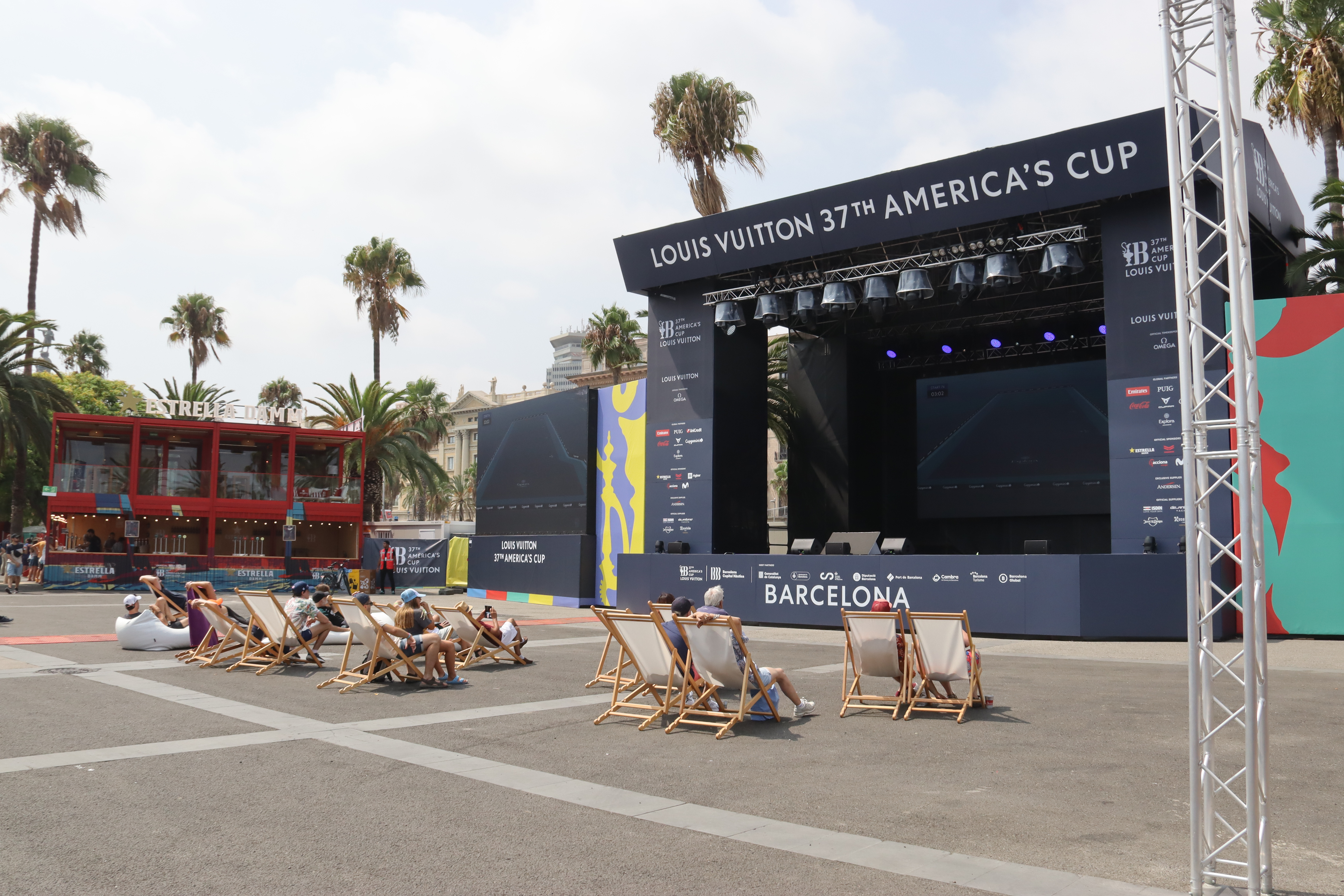 Spectators watching the first America's Cup race in the Race Village.