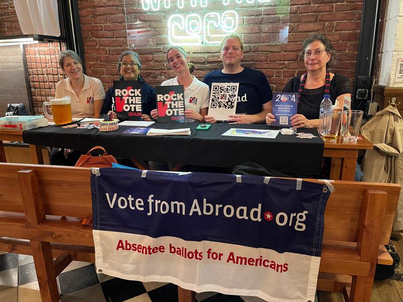 Volunteers with VoteFromAbroad.org and Rock The Vote Spain at an informational event in Barcelona's CocoVail Beer Hall