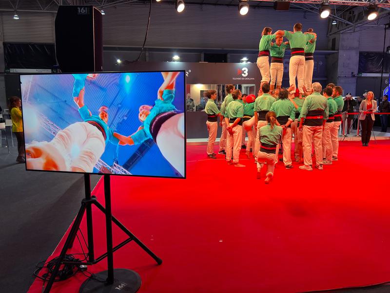 Catalan human towers display at the Catalan audiovisual corporation stand at the ISE audiovisual fair with a 360-degree camera on January 31, 2023