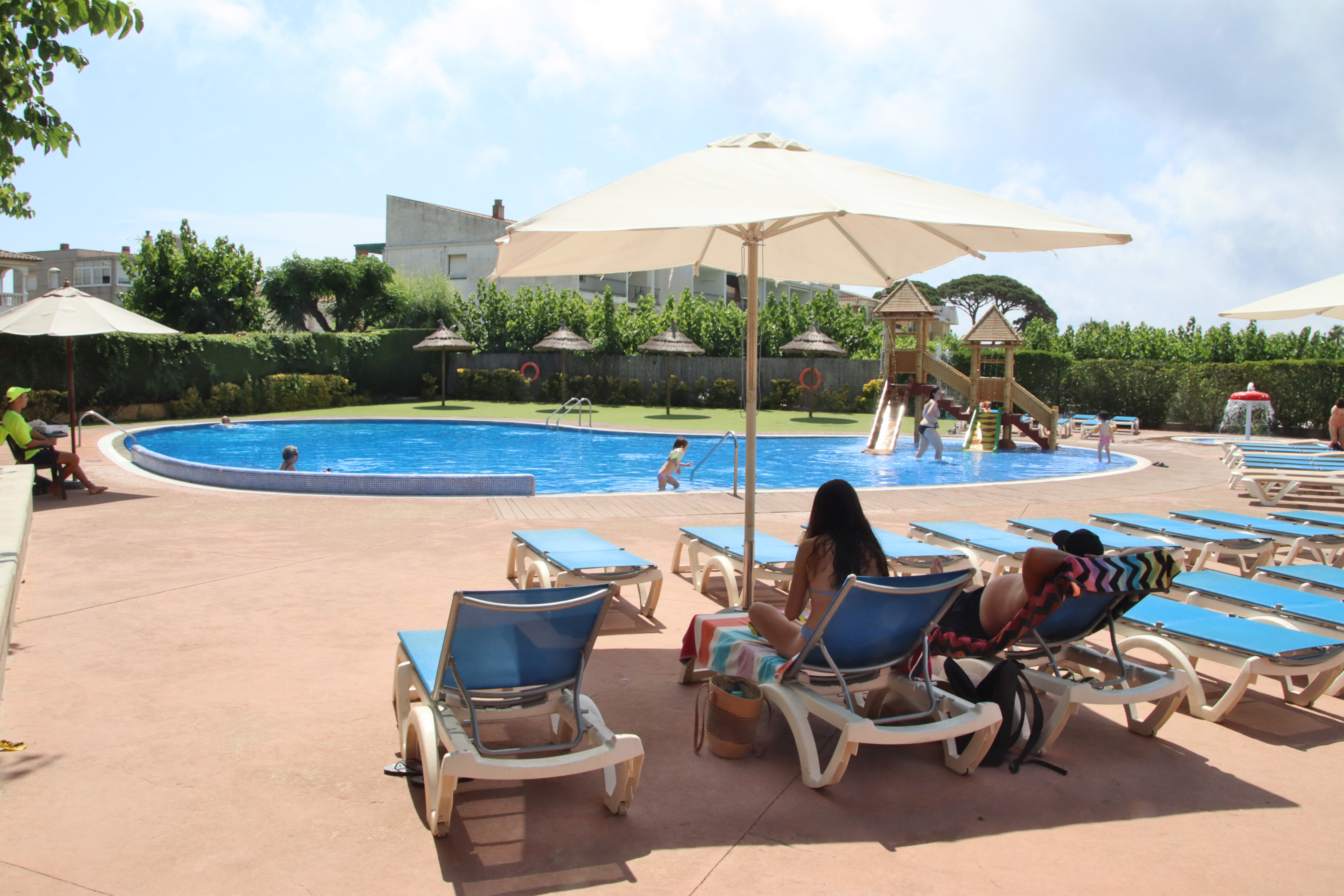 Tourists at the pool at Camping Joan in Cambrils