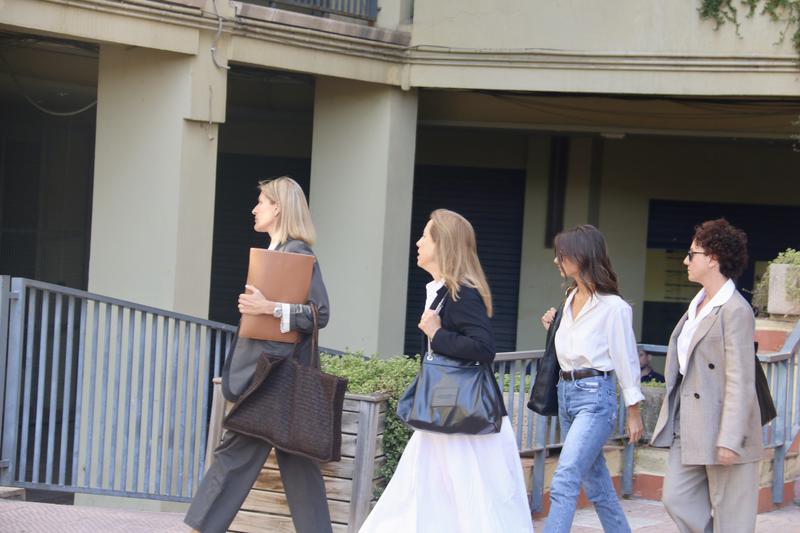 The Andic sisters, third and fourth in the group pictured, arrive at the courts in Martorell to testify