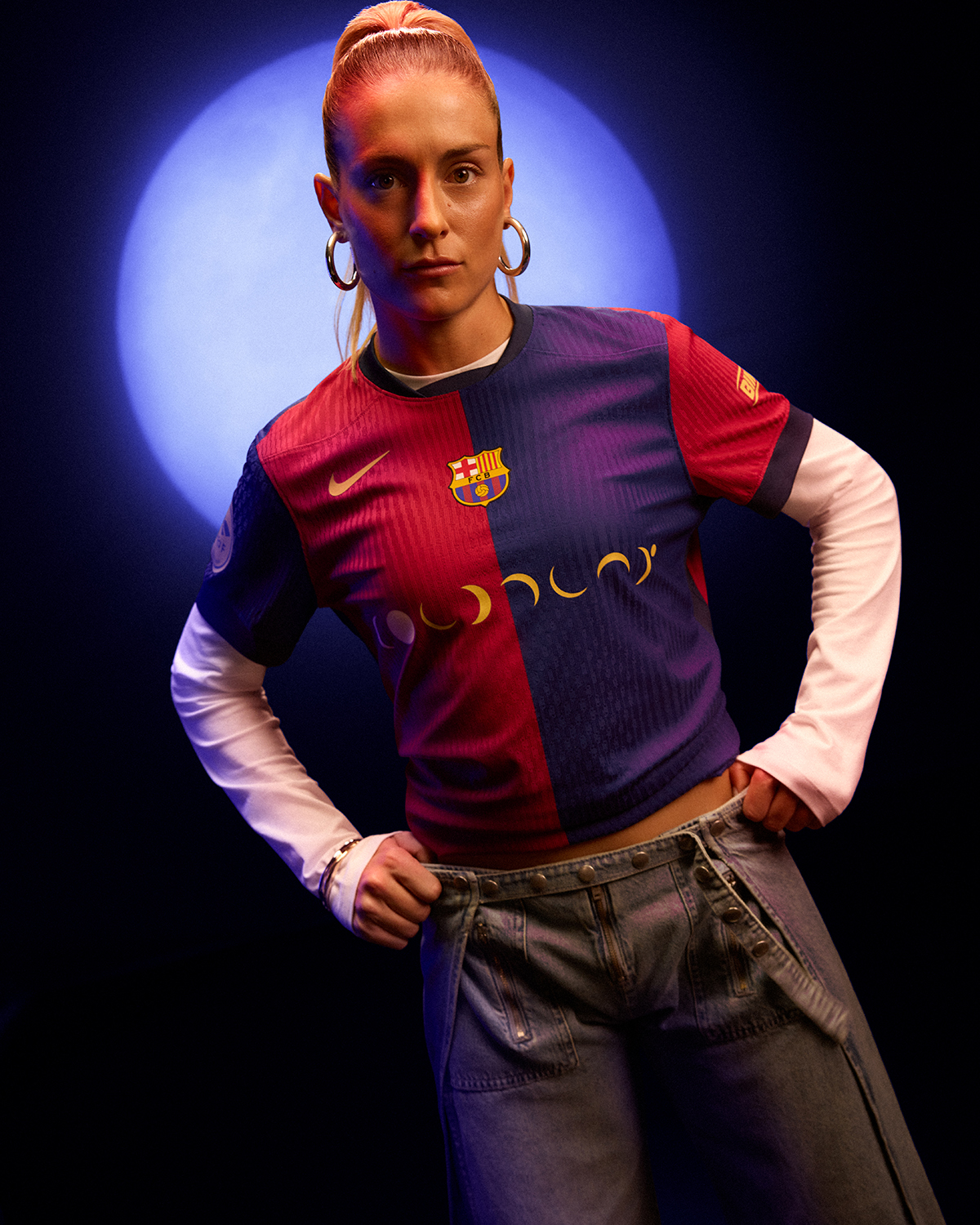 Alexia Putellas wearing the Barça jersey featuring Coldplay.