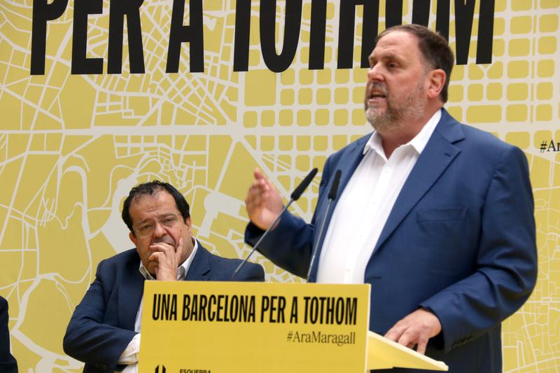 Esquerra Republicana party Oriol Junqueras speaks at a campaign event in Poblenou, Barcelona, in front of Catalonia's interior minister Joan Ignasi Elena