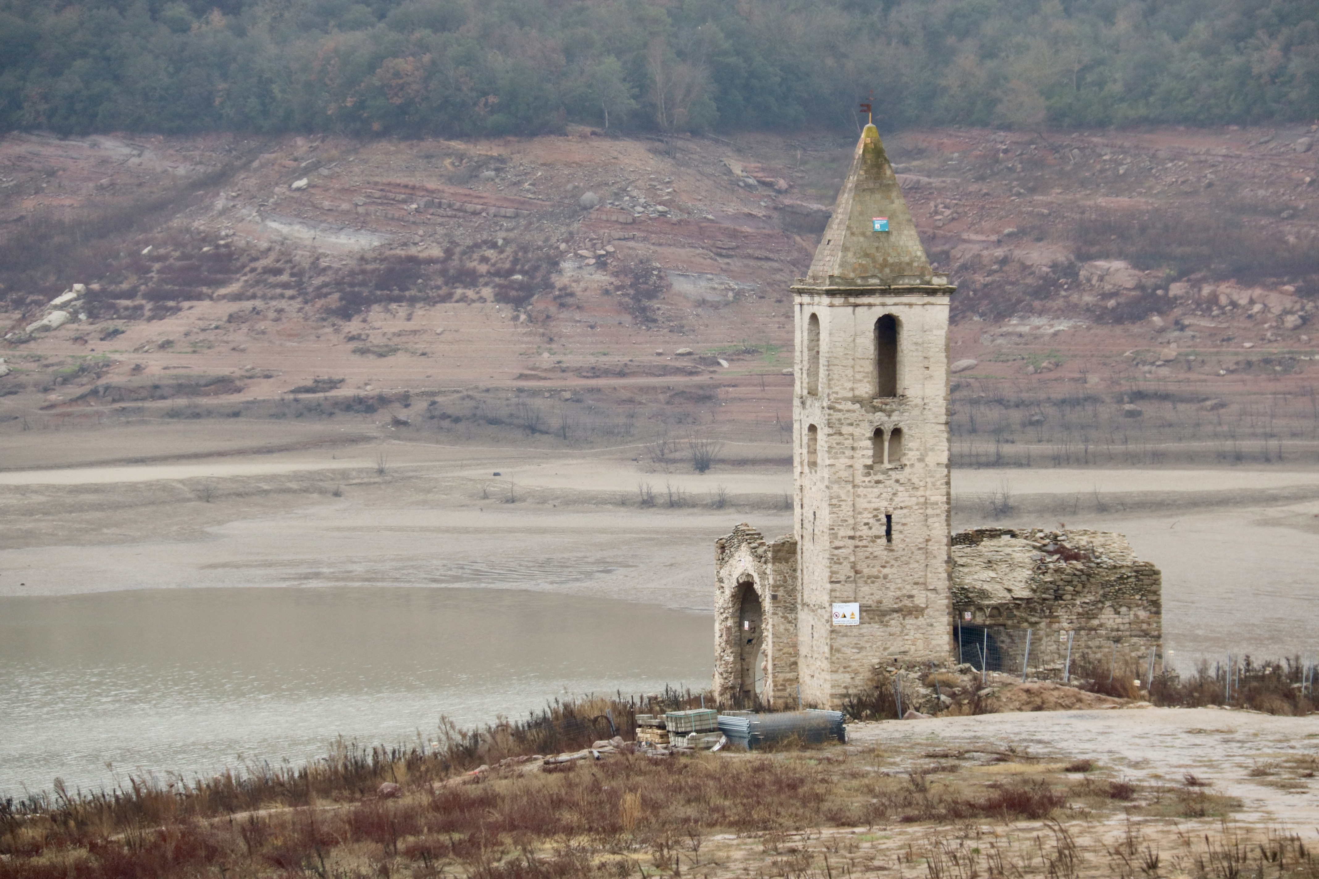 The Sant Romà de Sau church pictured in 2023 without any water surrounding the building