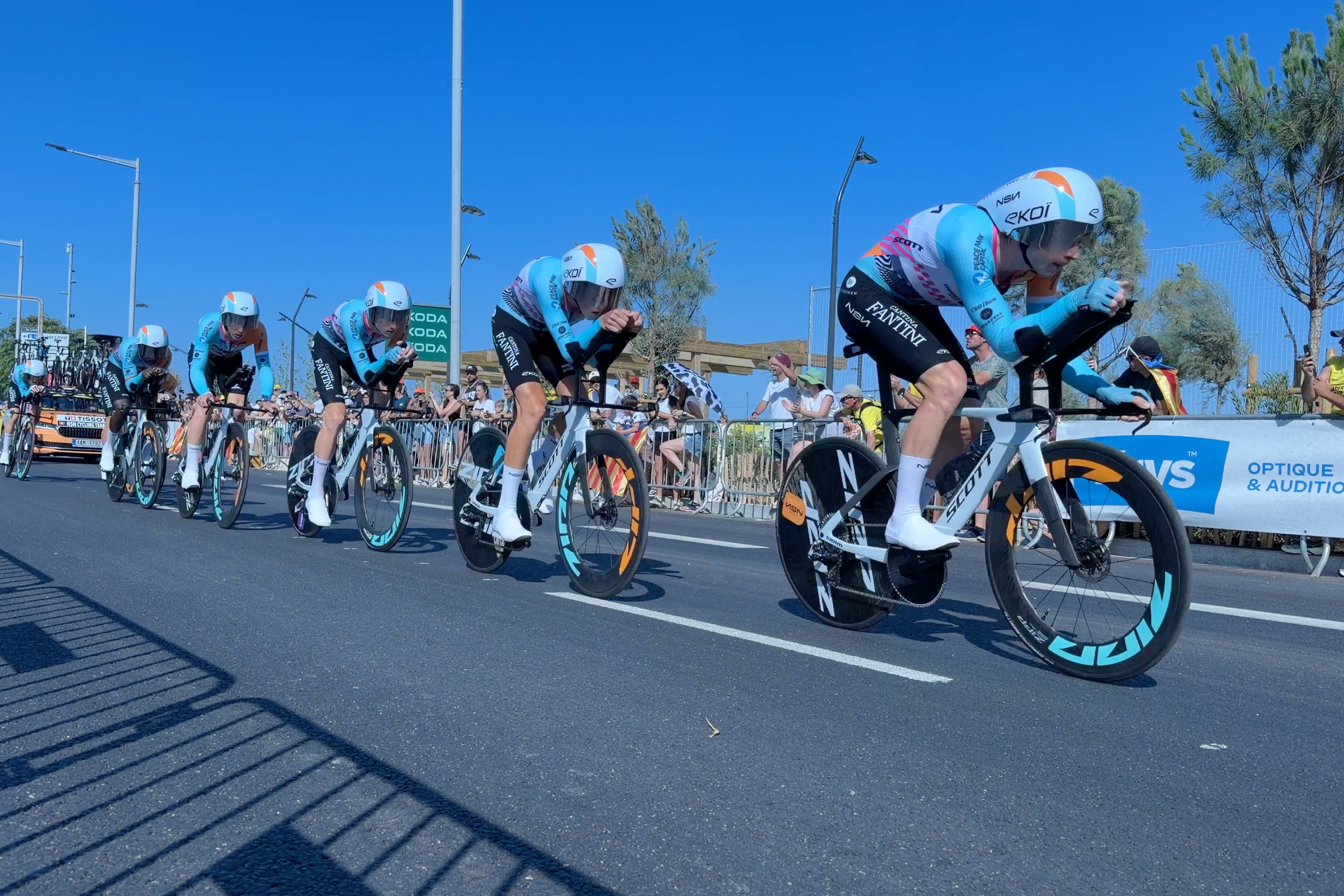 Members of the NSN Cycling team participating in the time trial of the first stage of the Tour de France in Barcelona.