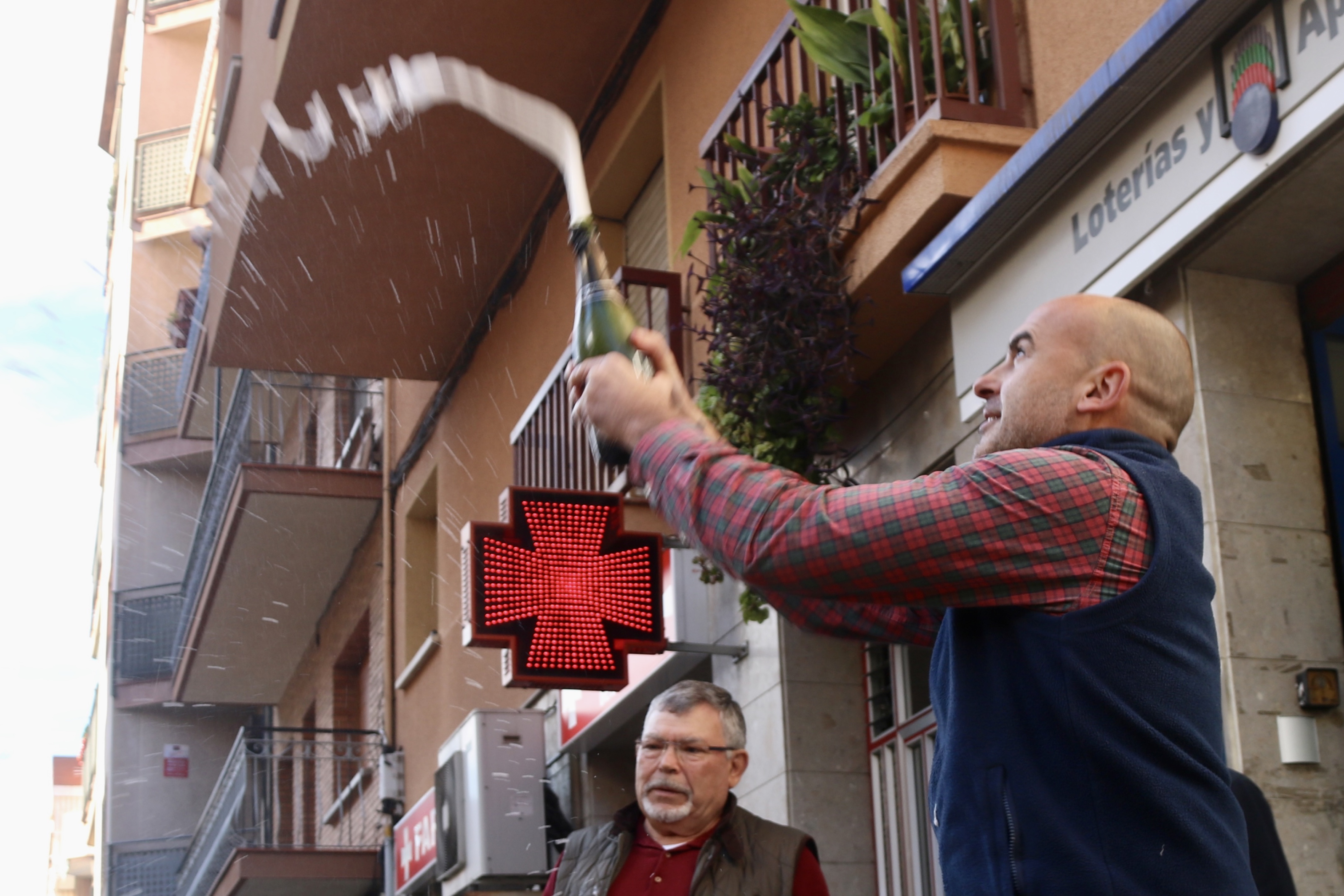 Alfonso López, responsible for Barberà del Vallès 2nd lottery retail celebrates selling some lottery ticket prizes on December 22, 2022