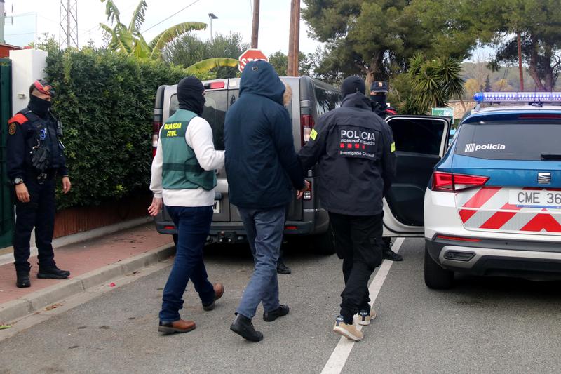 Mossos d'Esquadra and Guardia Civil officers arrest a man in Sant Pere de Ribes as part of an anti-terrorism operation