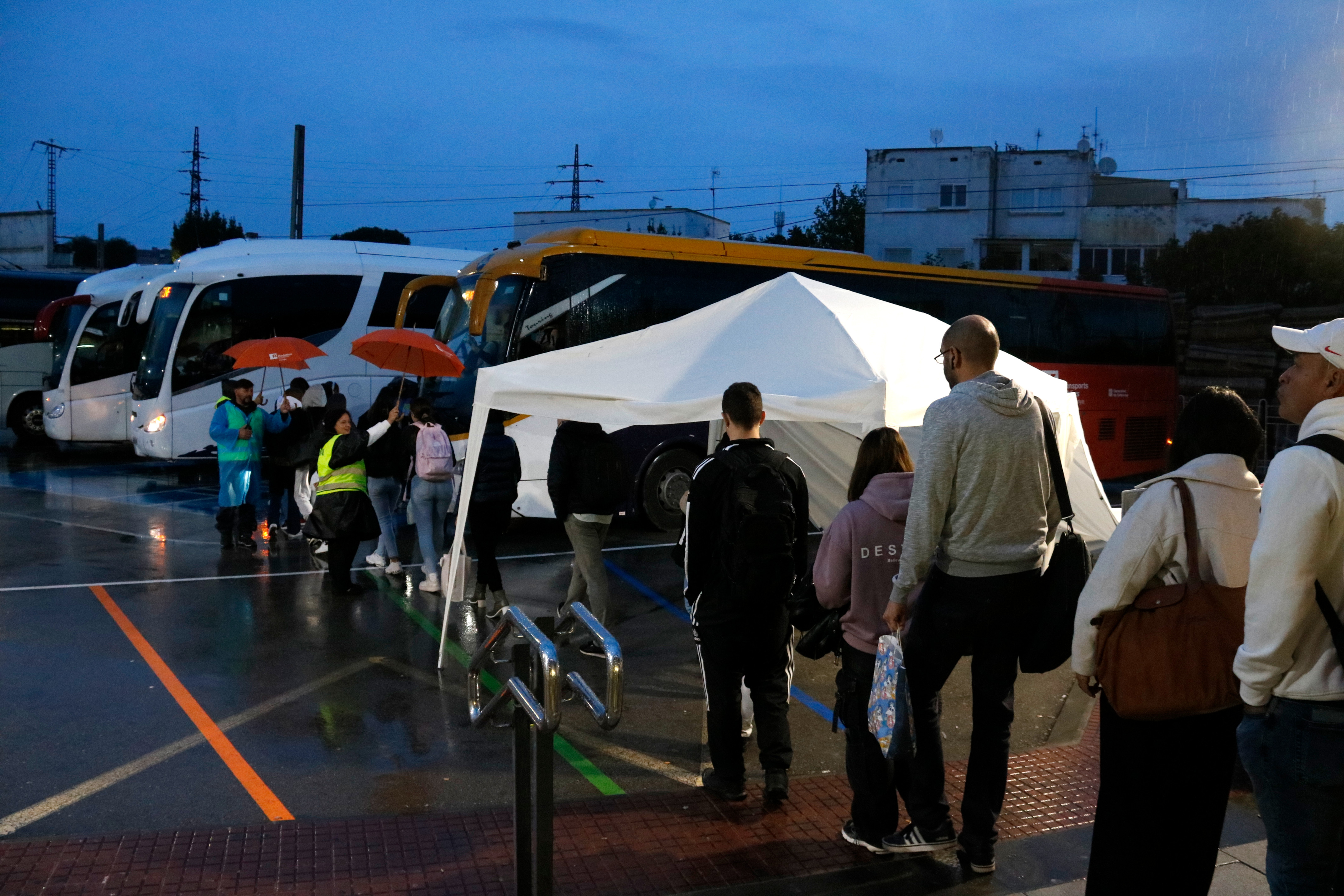 Passengers waiting for the bus from Sant Vicenç de Calders to Tarragona.