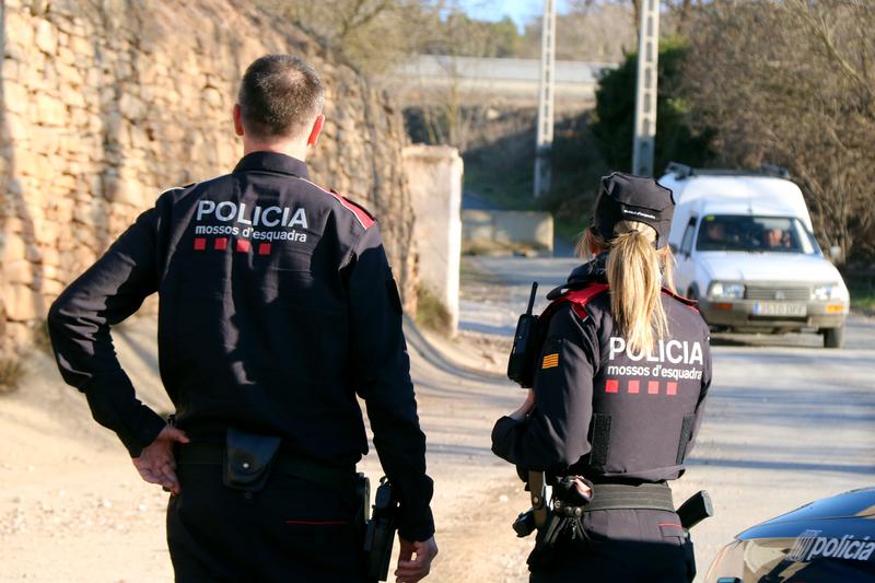 Mossos d'Esquadra police officers at a checkpoint to prevent access to an illegal rave in Sarral