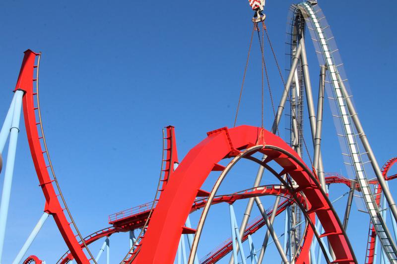 The bottom and superior parts of the 'vertical loop' of PortAventura's Dragon Khan during a maintenance operation