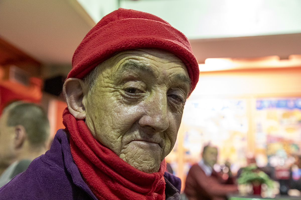 One person attending the Arrels Christmas dinner in 2019 for the homeless in Barcelona